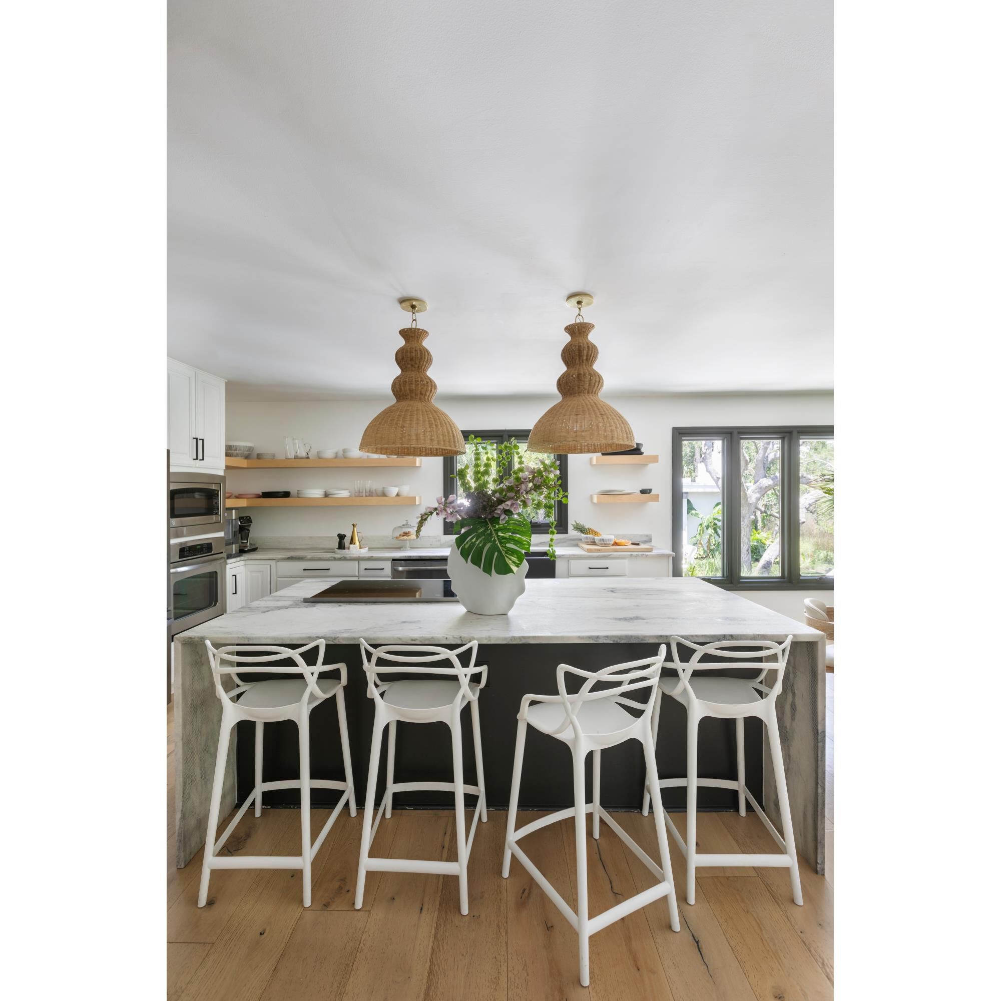 Shown in Aged Brass finish and Natural Woven shade