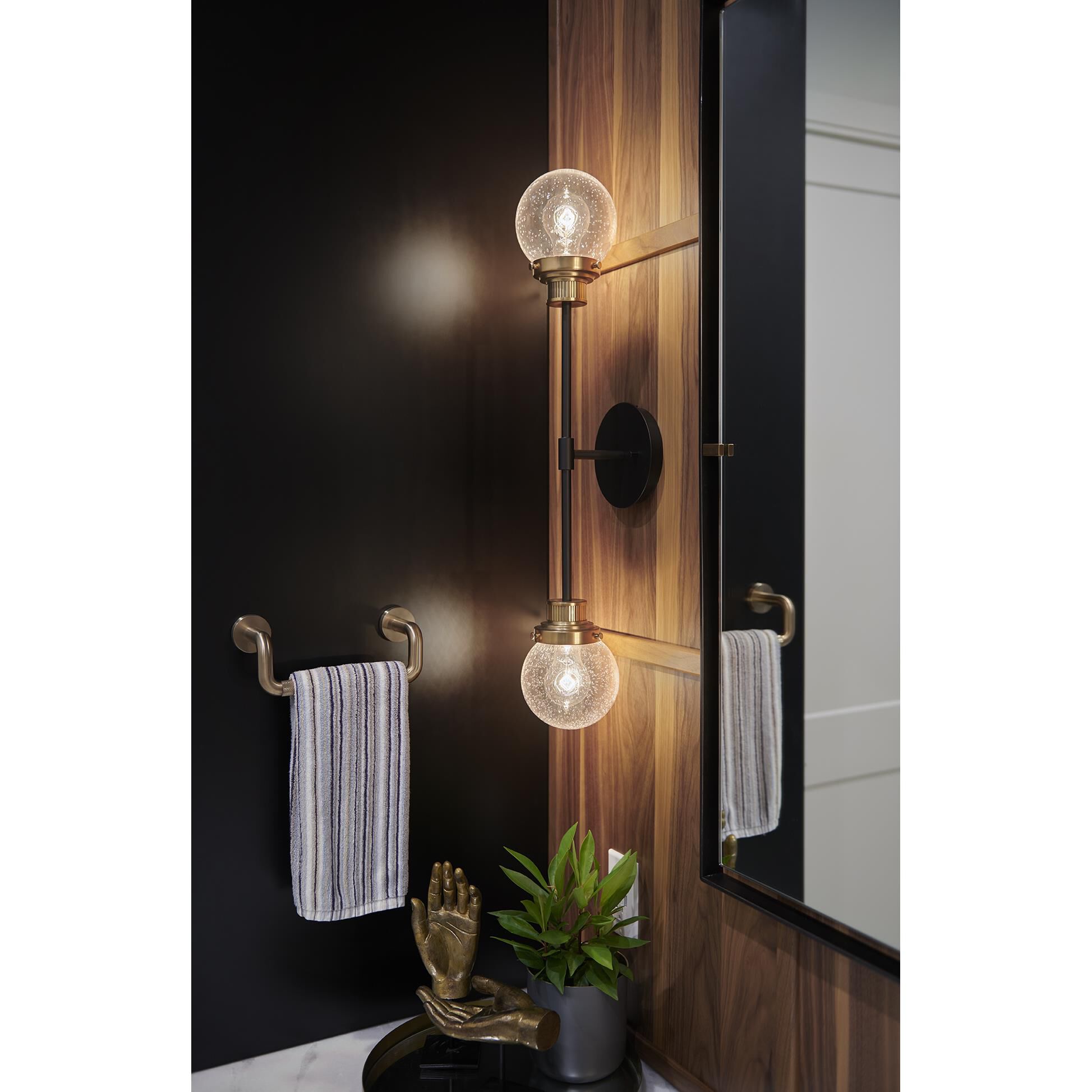 Shown in Black finish and Clear Seedy glass and Heritage Brass accent