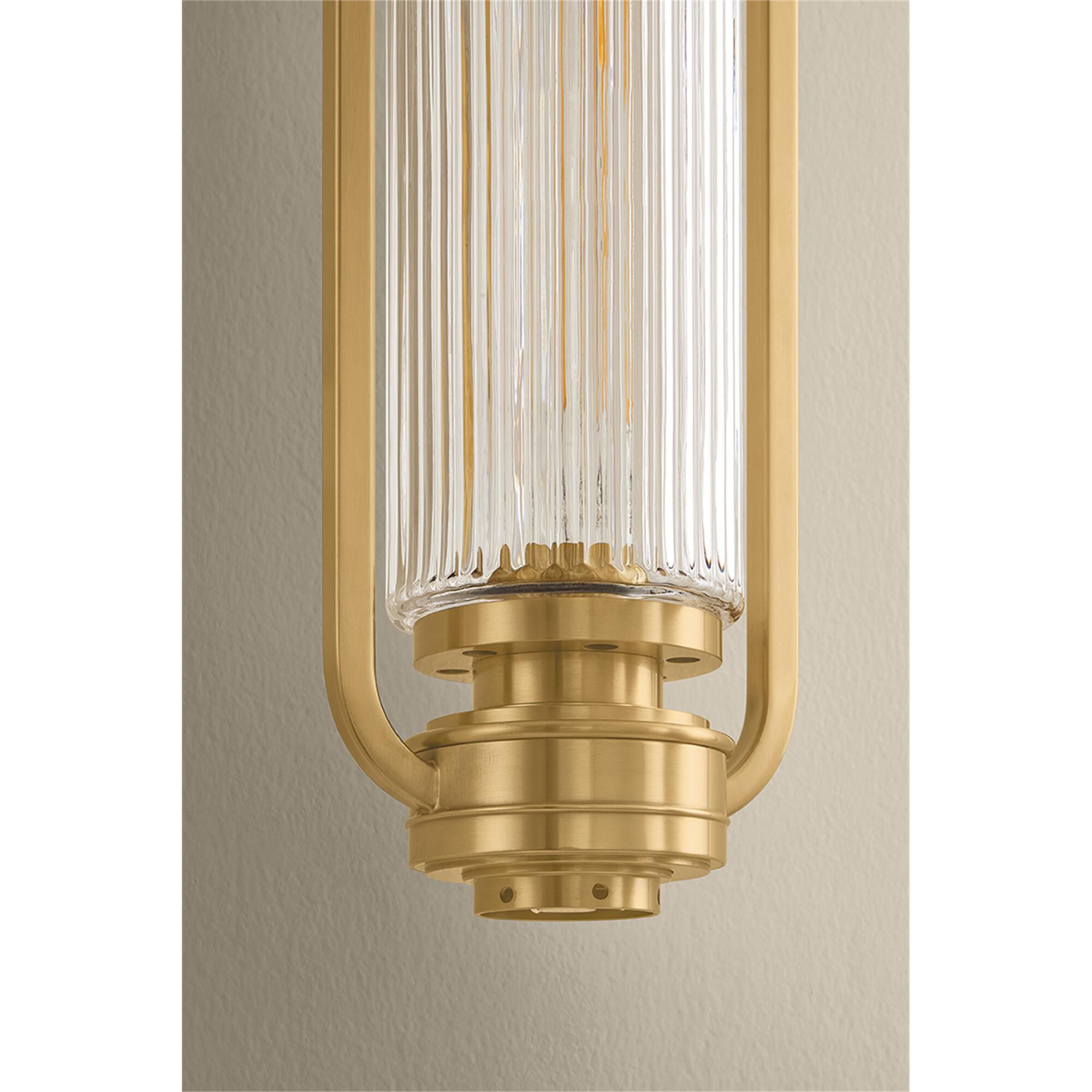 Shown in Aged Brass finish and Clear Optic glass