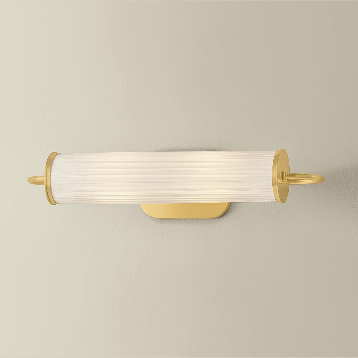 Shown in Aged Brass finish and Ivory Silk shade