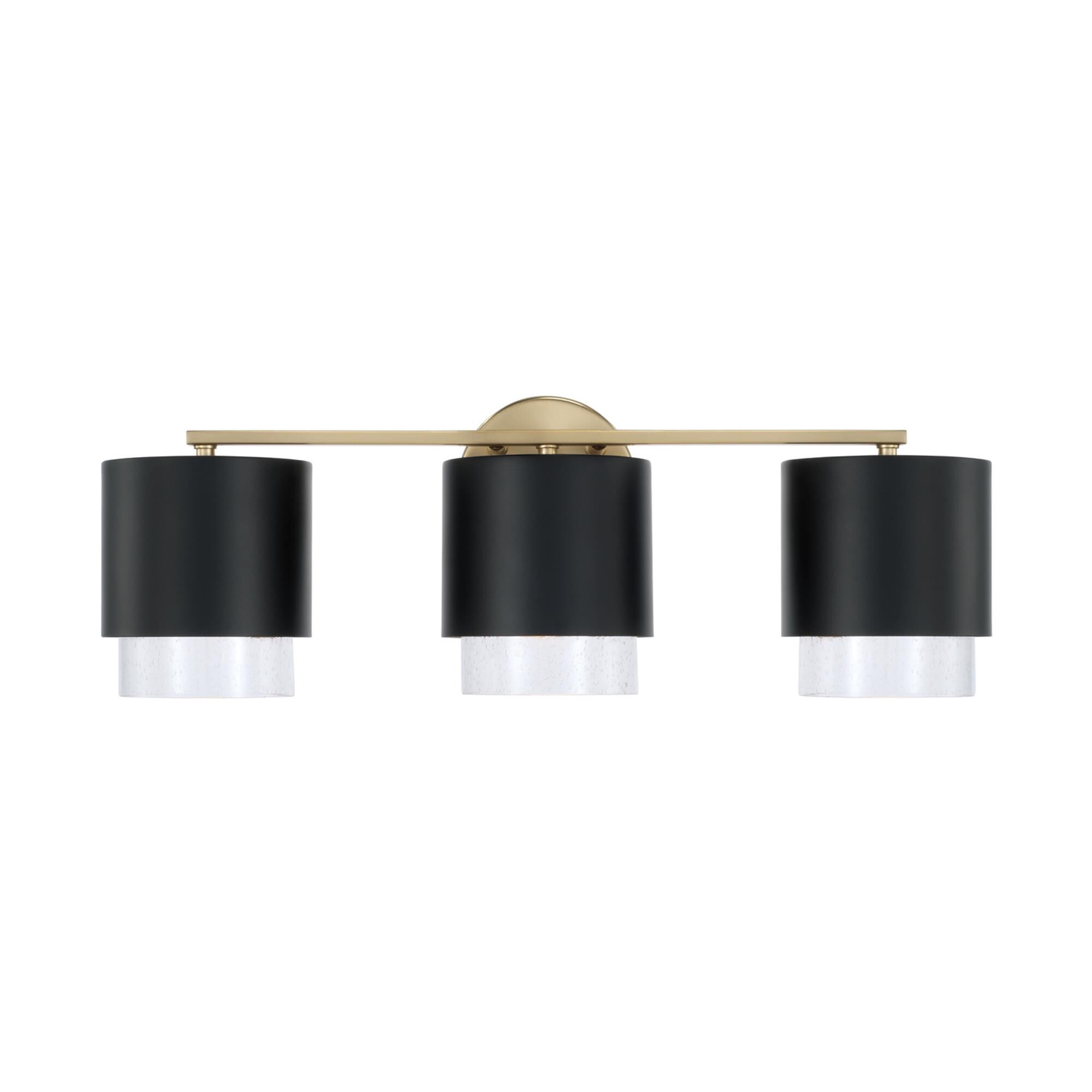 Shown in Matte Brass and Black finish and Clear Seeded glass and Metal with Brass Interior shade