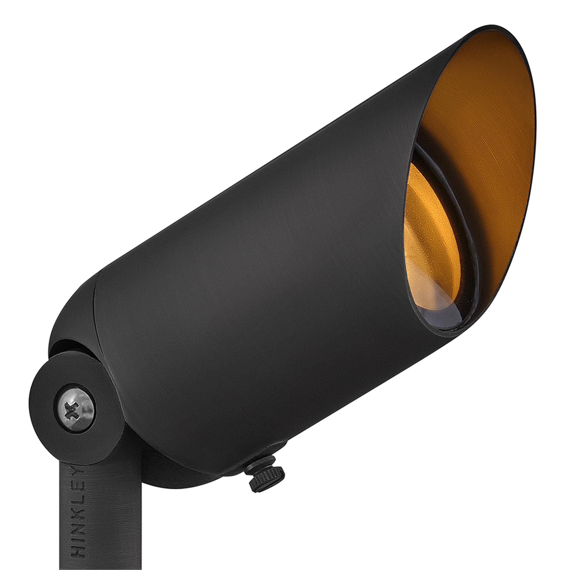 Shown in Brass Satin Black finish and Clear Lens glass