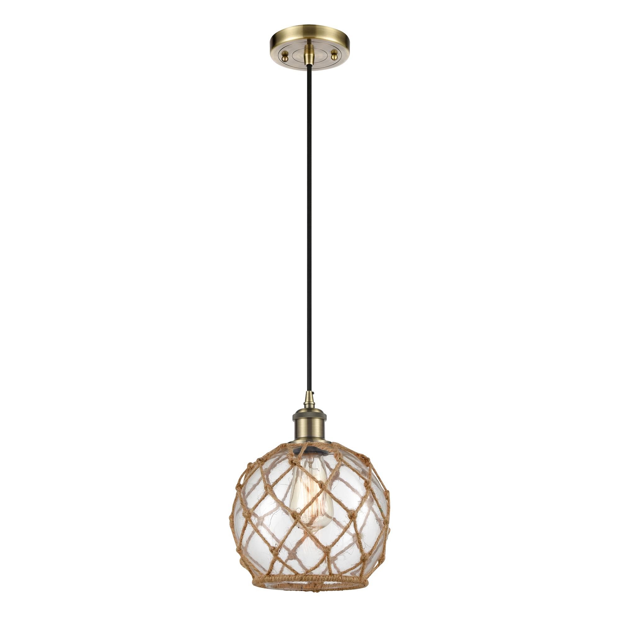 Shown in Antique Brass finish and Sphere glass and Glass And Rope shade