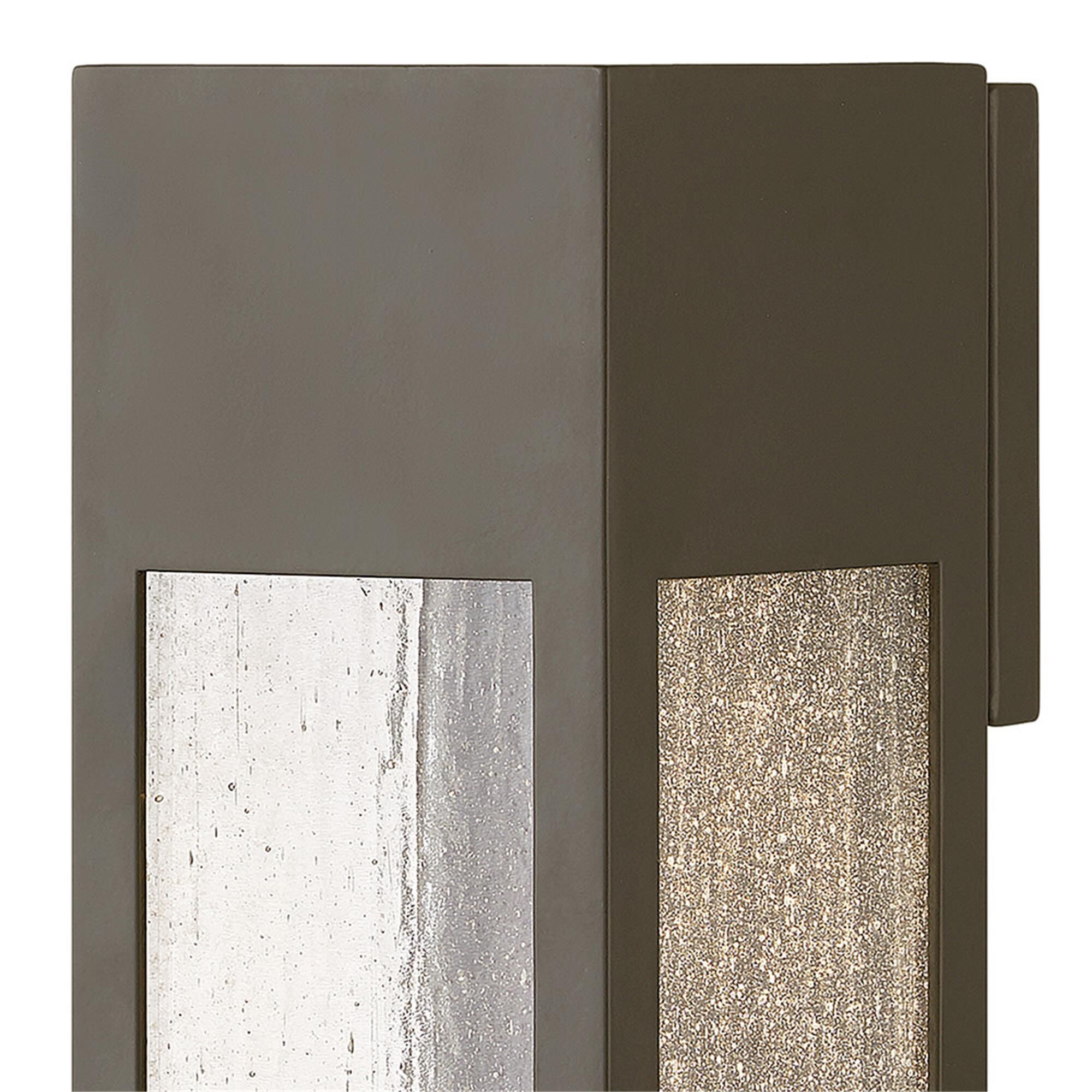 Shown in Bronze finish and Clear Seedy glass