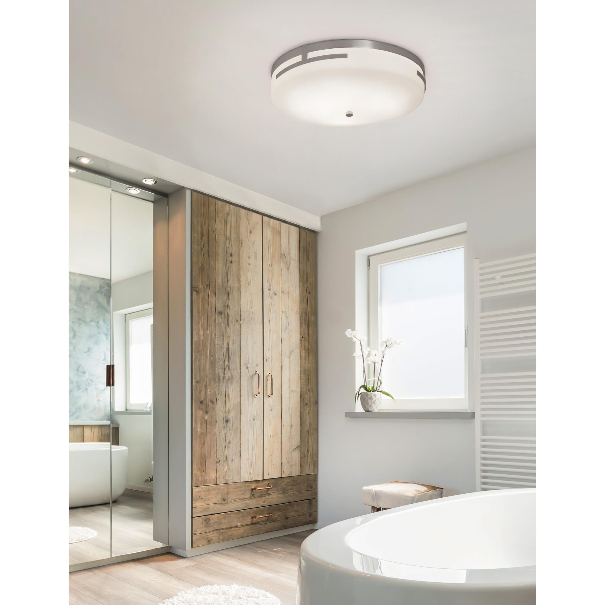 Shown in Polished Chrome finish and Artisan glass and Opal shade