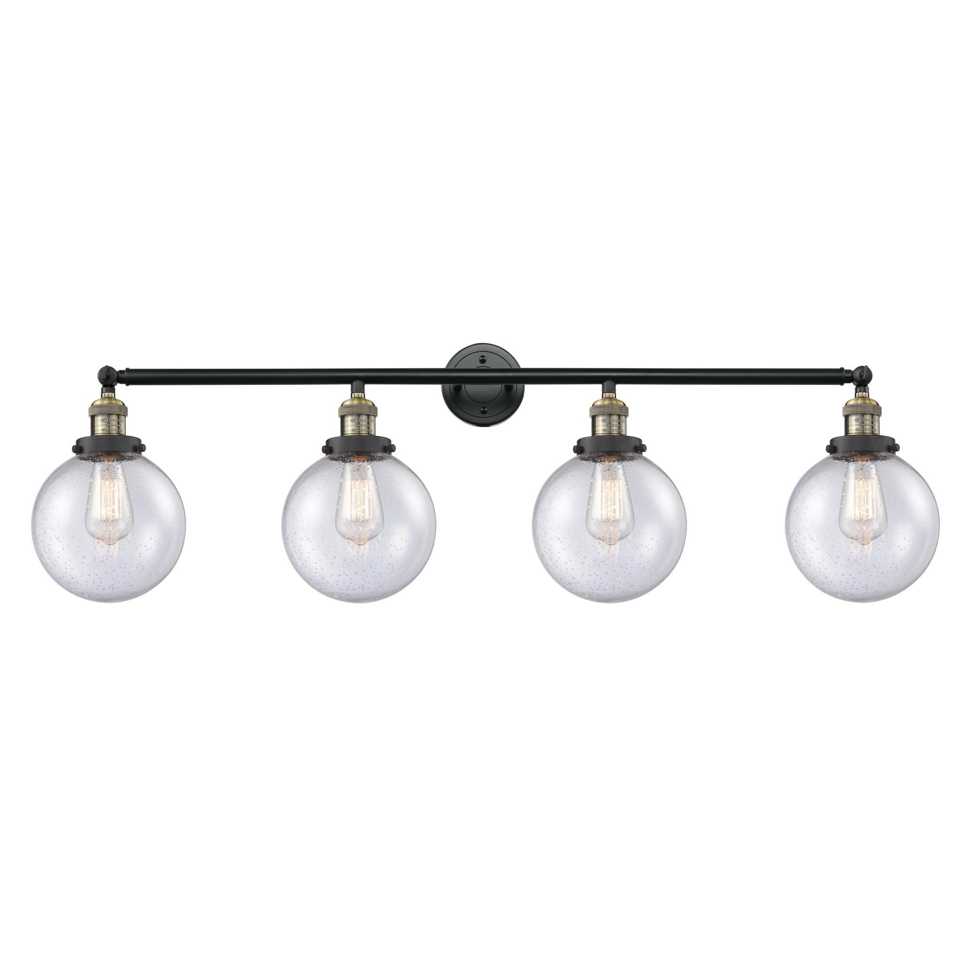 Shown in Black Antique Brass finish and Seedy Beacon glass