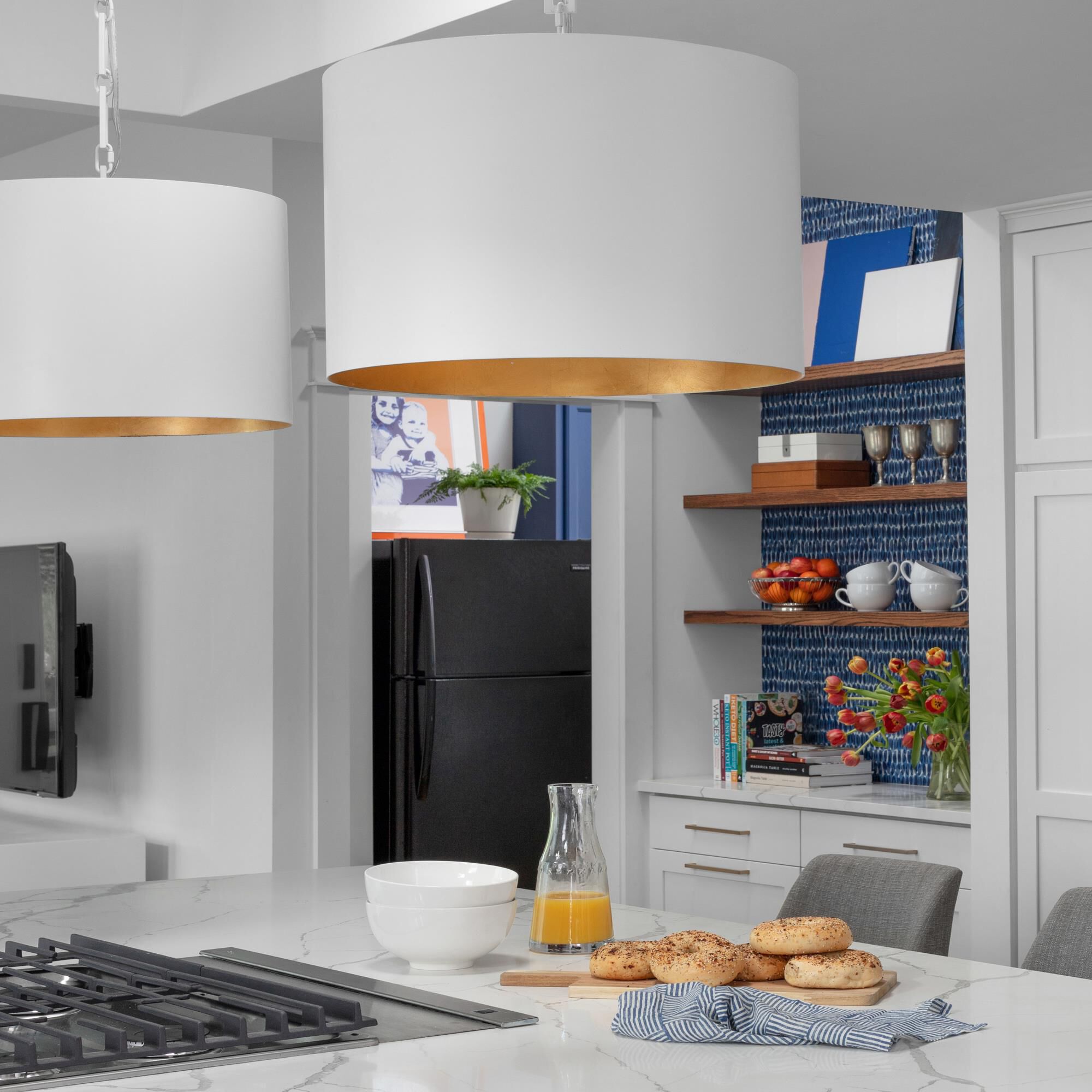 Shown in Matte White + Antique Gold finish and Steel glass and White & Gold Drum shade