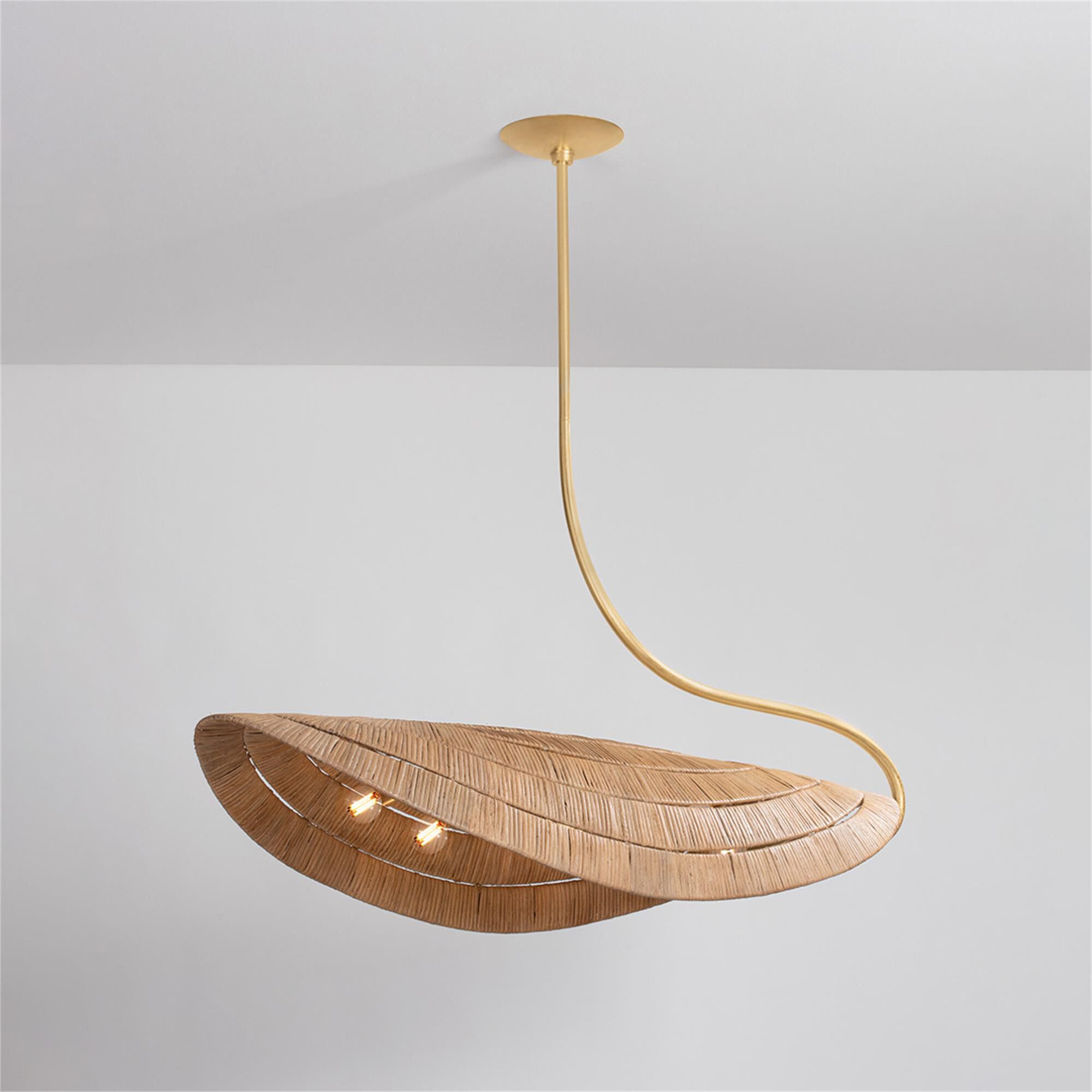 Shown in Gold Leaf finish and Natural Rattan shade