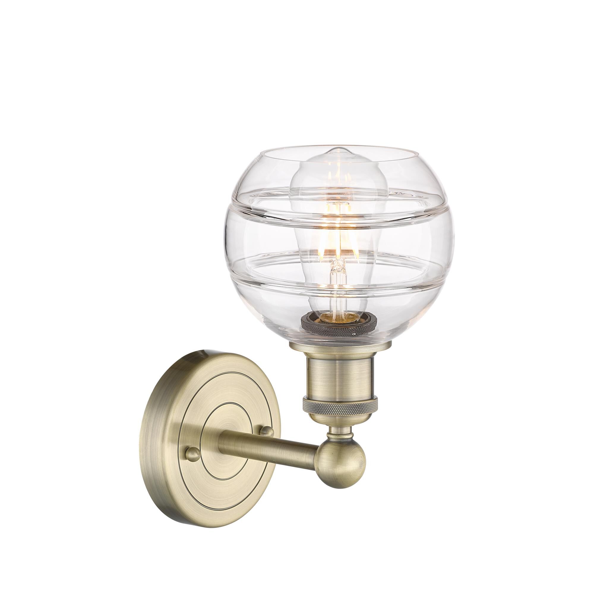 Shown in Antique Brass finish and Clear glass