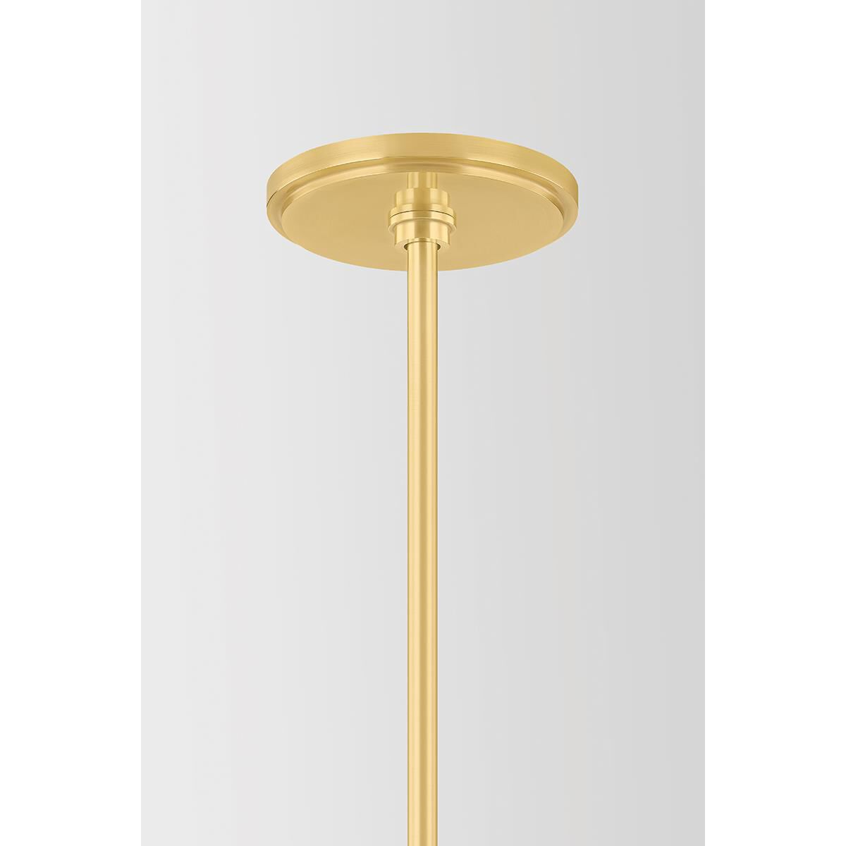 Shown in Aged Brass finish and Piastre With White Swirl glass