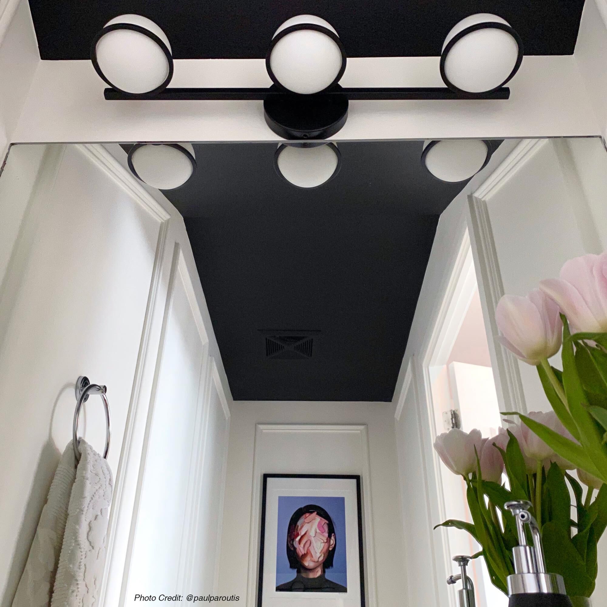 Shown in Black and White finish and White Globe glass and White accent