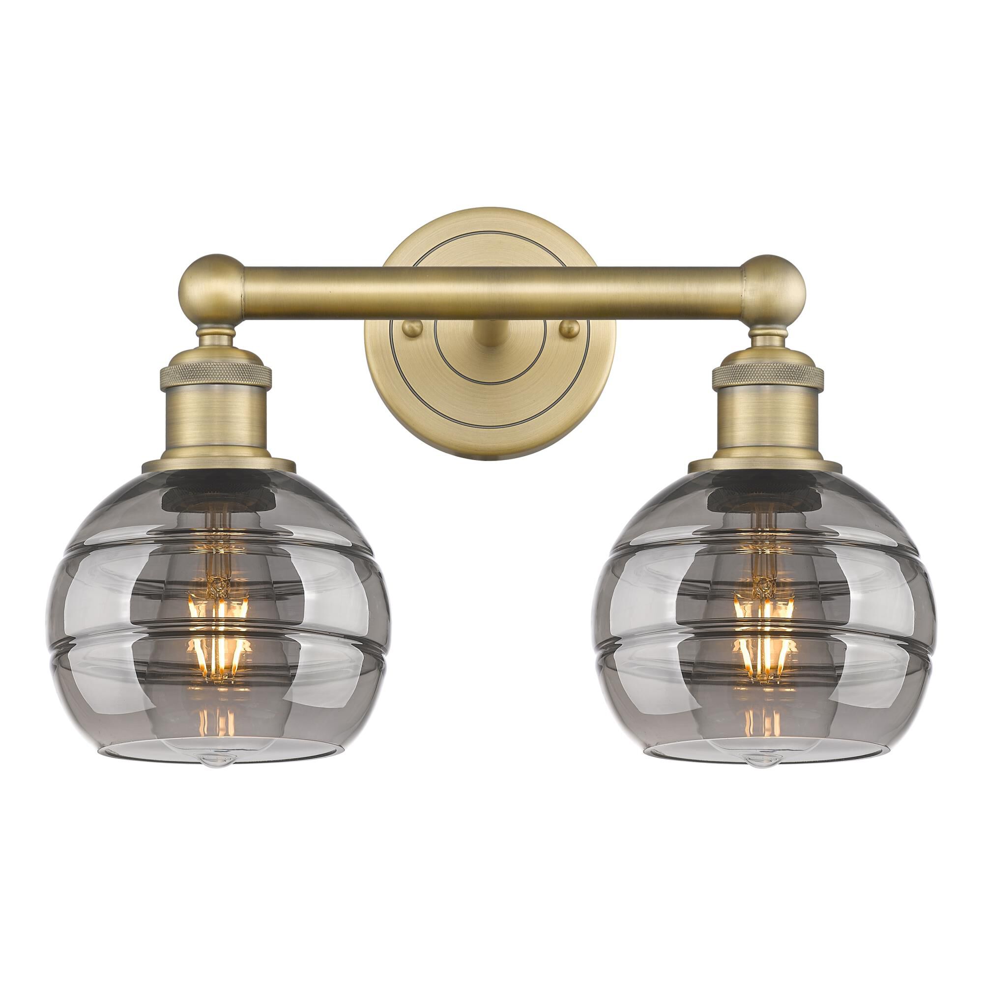 Shown in Brushed Brass finish and Light Smoke glass