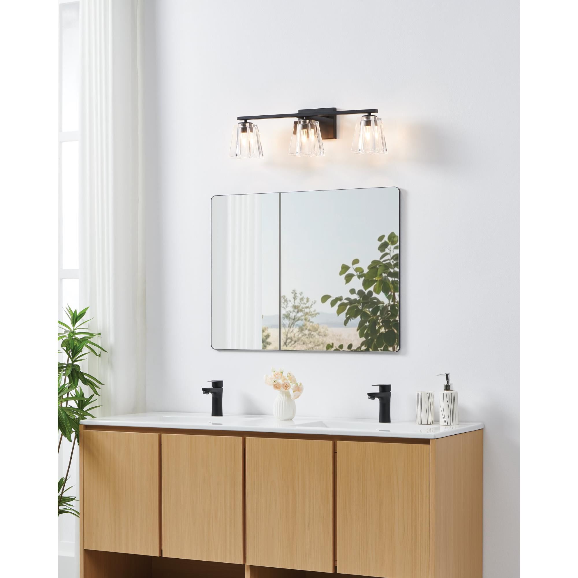 Shown in Matte Black finish and Clear Pressed glass