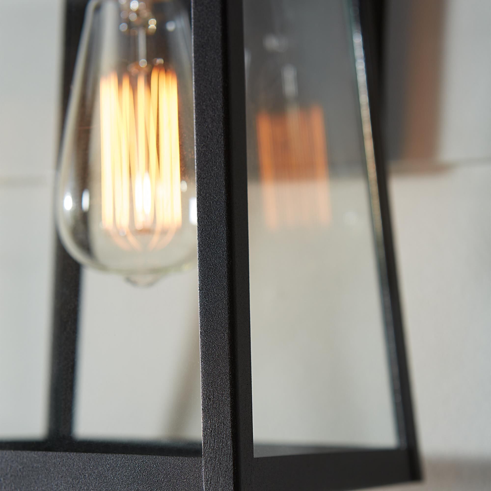 Shown in Black finish and Clear glass