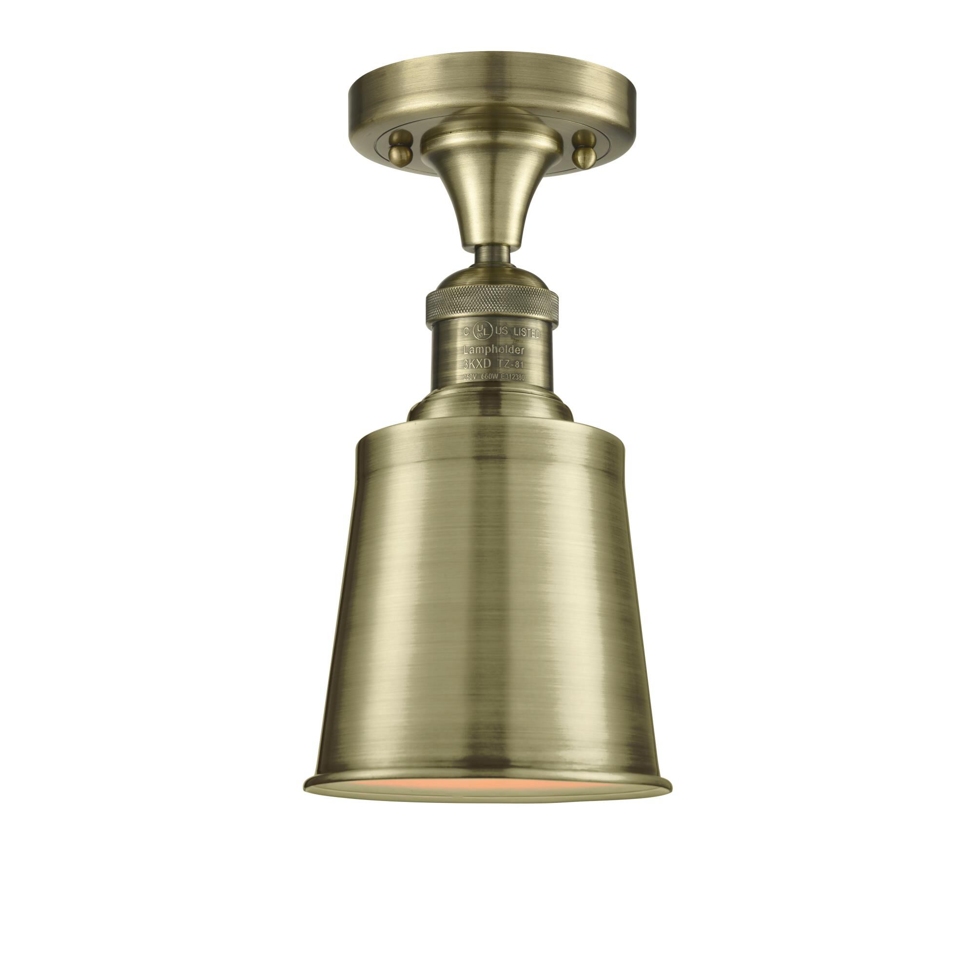 Shown in Antique Brass finish and Antique Brass shade