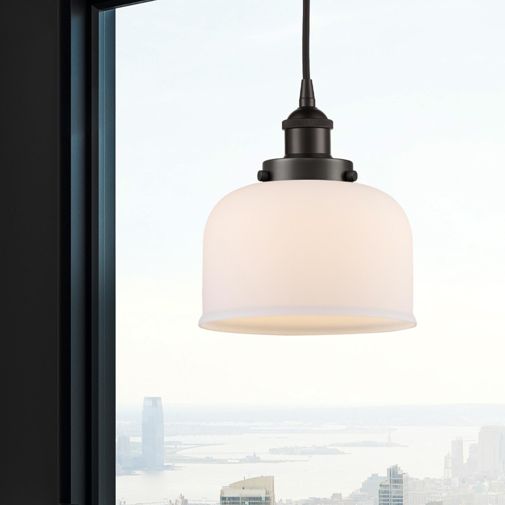Shown in Oil Rubbed Bronze finish and Matte White glass
