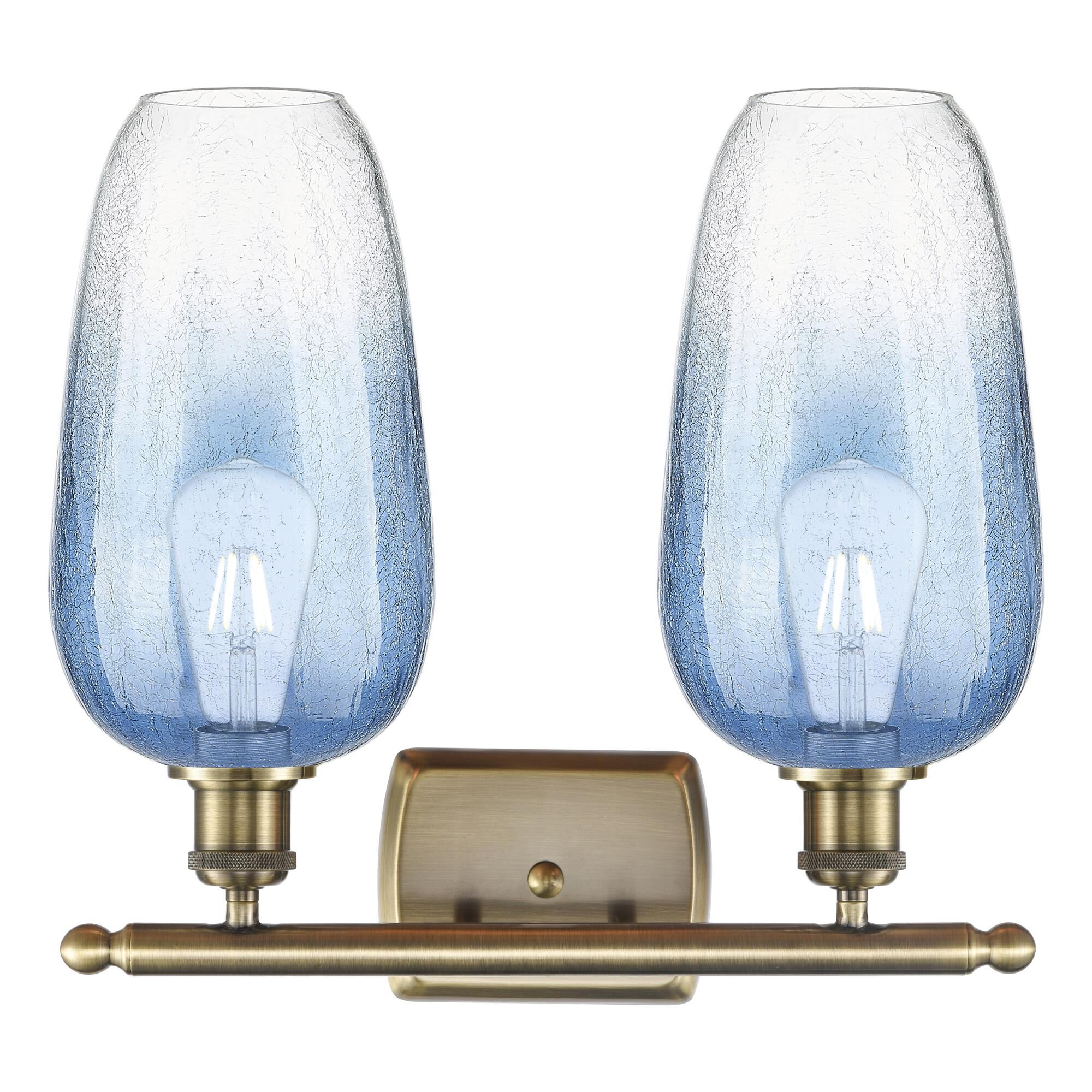 Shown in Antique Brass finish and Sapphire Blue glass
