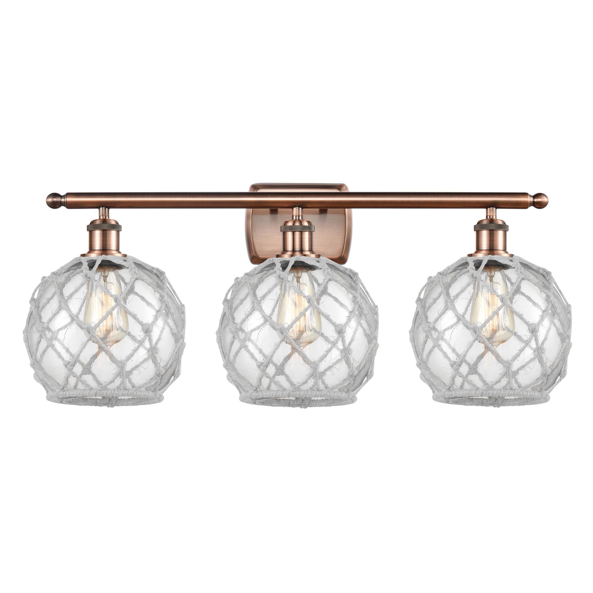 Shown in Antique Copper finish and Sphere glass and Glass And Rope shade and Polished Chrome accent