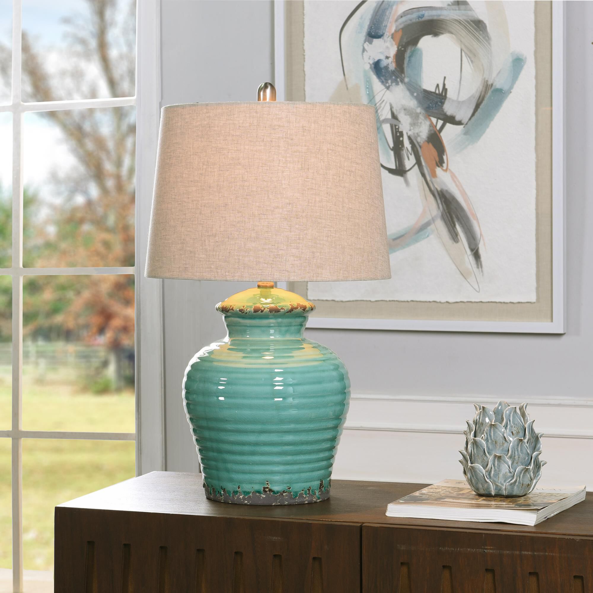 Shown in Turquoise finish and Beige Hardback Linen shade