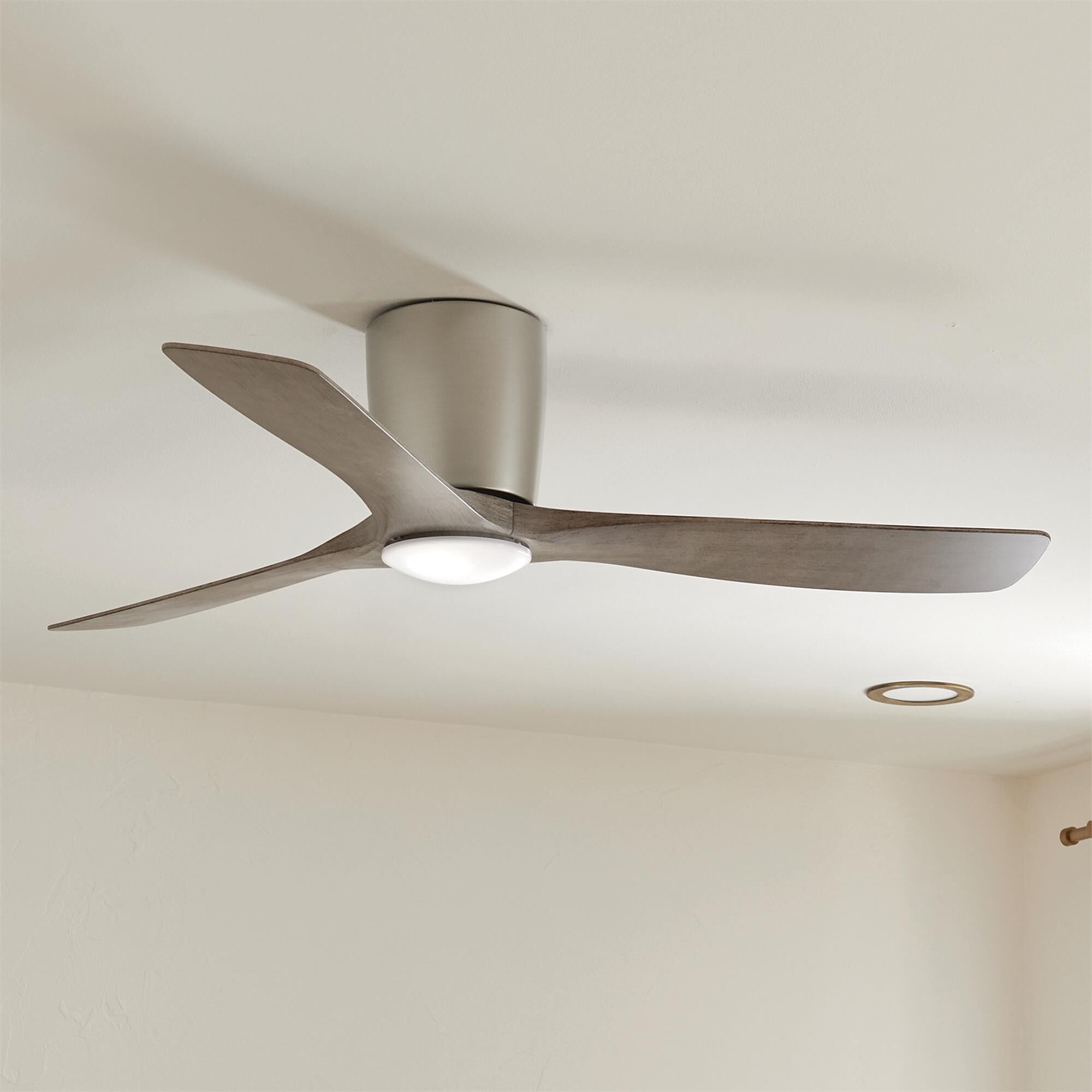 Shown in Brushed Nickel finish and Frosted White Polycarbonate Lens glass