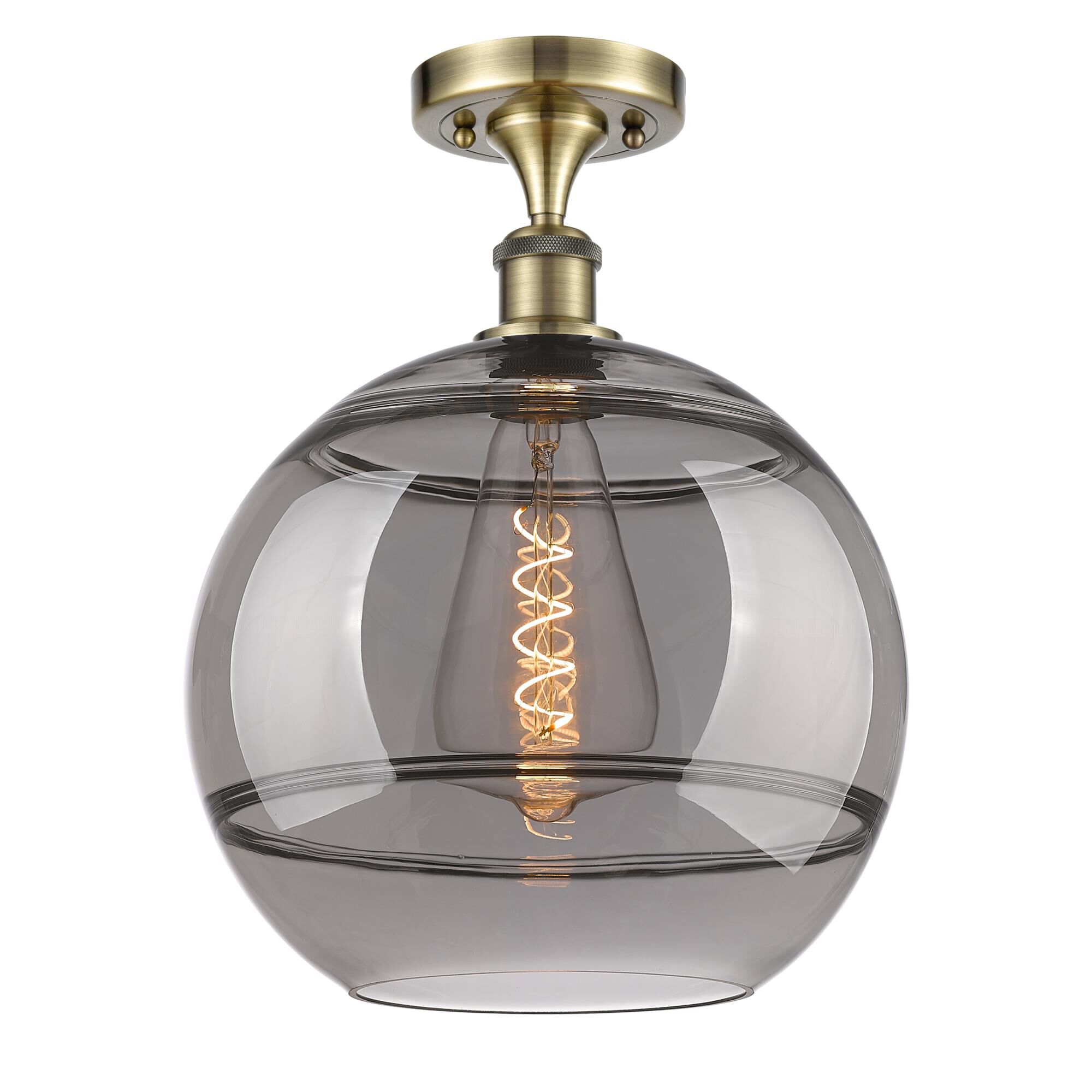 Shown in Antique Brass finish and Light Smoke glass