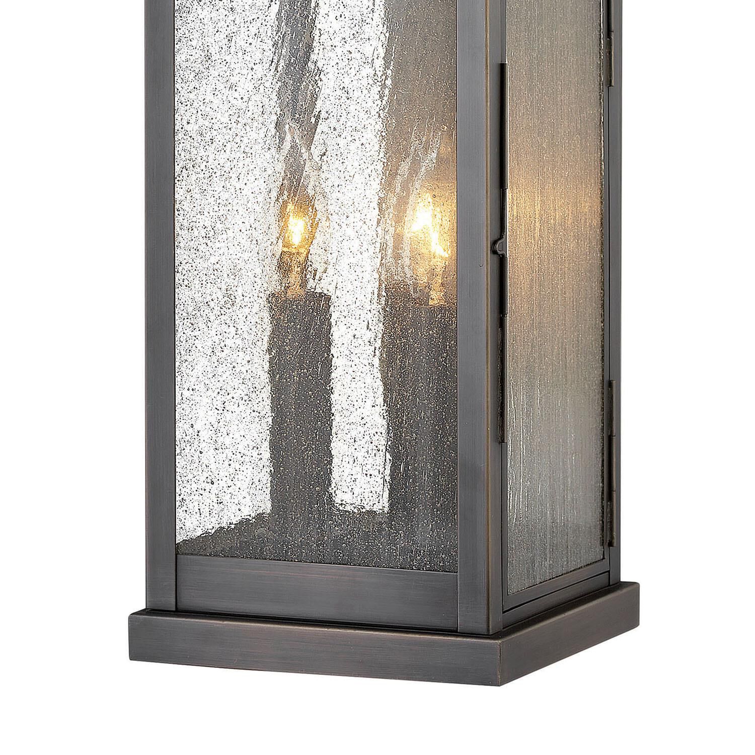 Shown in Blackened Brass finish and Clear Seedy glass