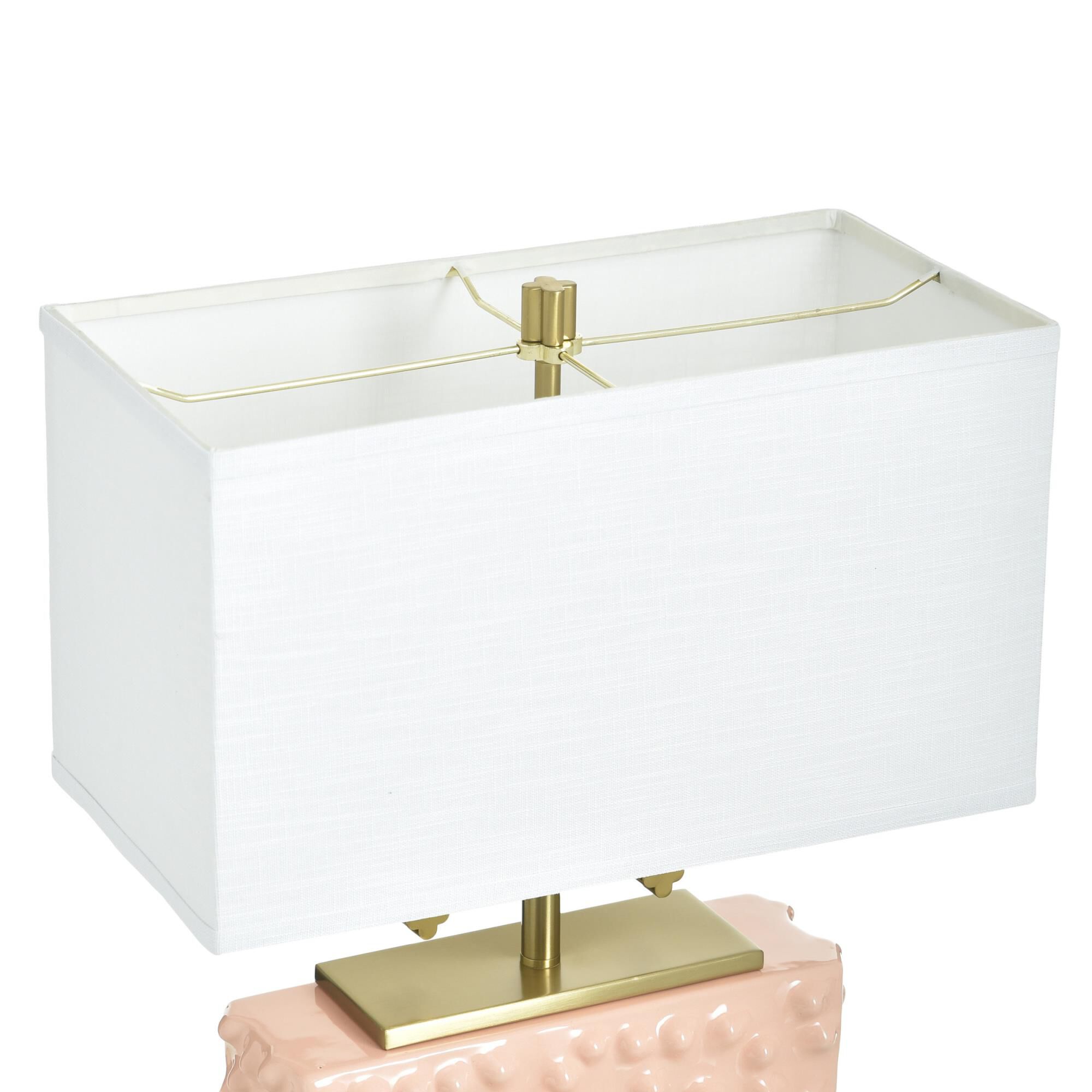 Shown in Pearl Blush and Polished Brass finish and Off-White shade