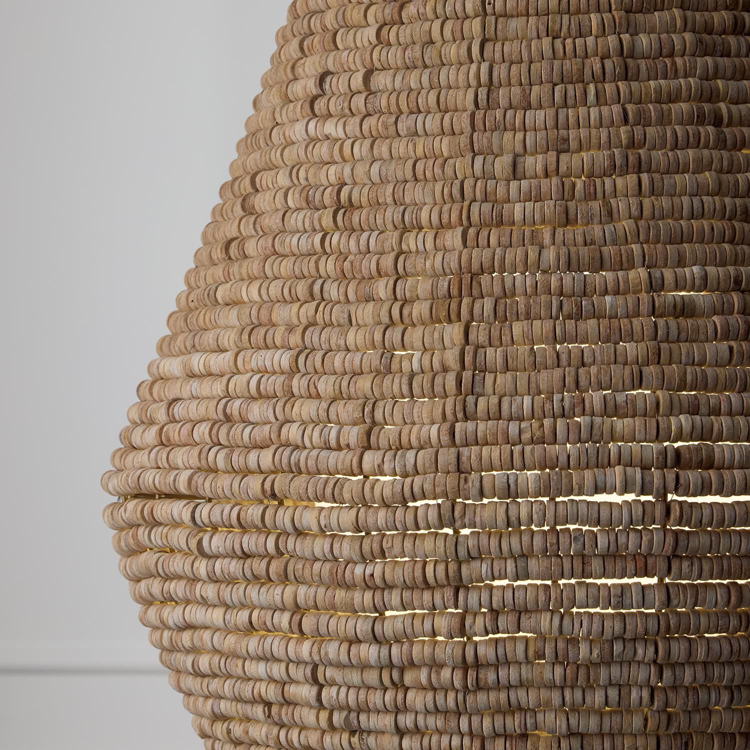 Shown in Light Fawn And Matte Brass finish and White  Globe glass