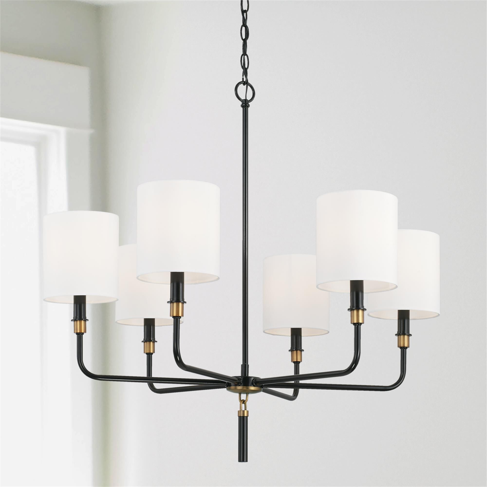 Shown in Glossy Black And Aged Brass finish and 702 glass and White Fabric Stay-Straight shade