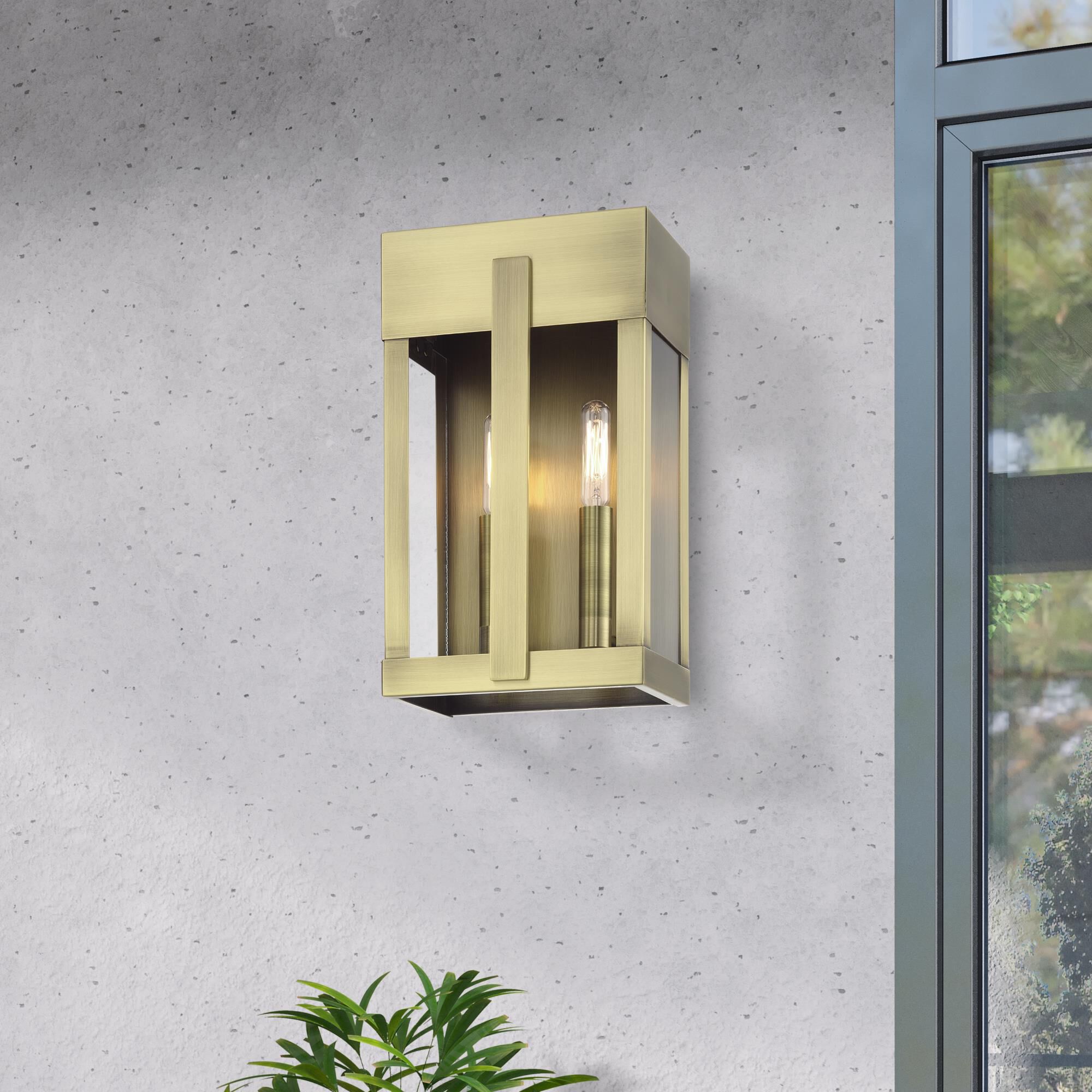 Shown in Antique Brass finish and Clear glass