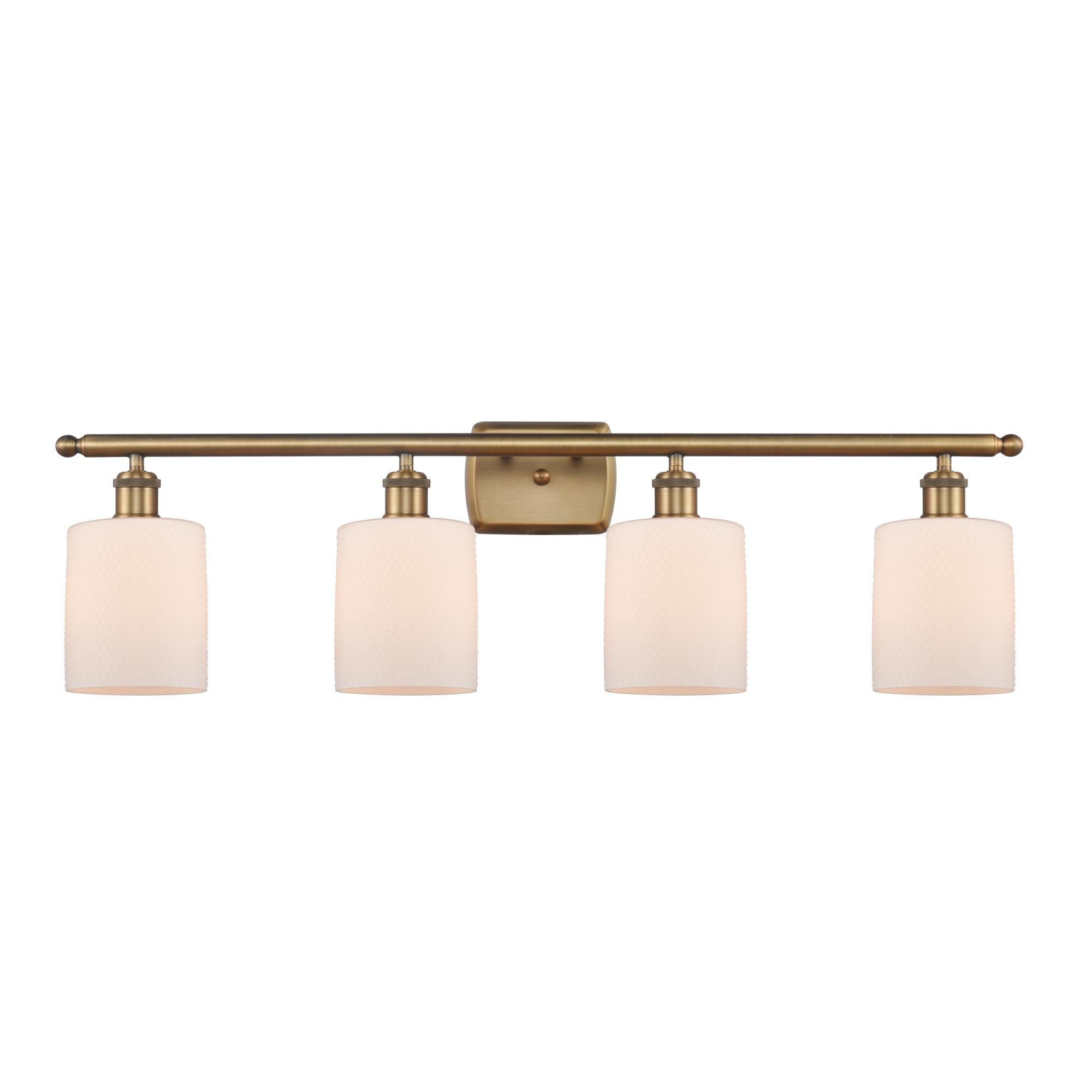 Shown in Brushed Brass finish and Drum glass and Glass shade