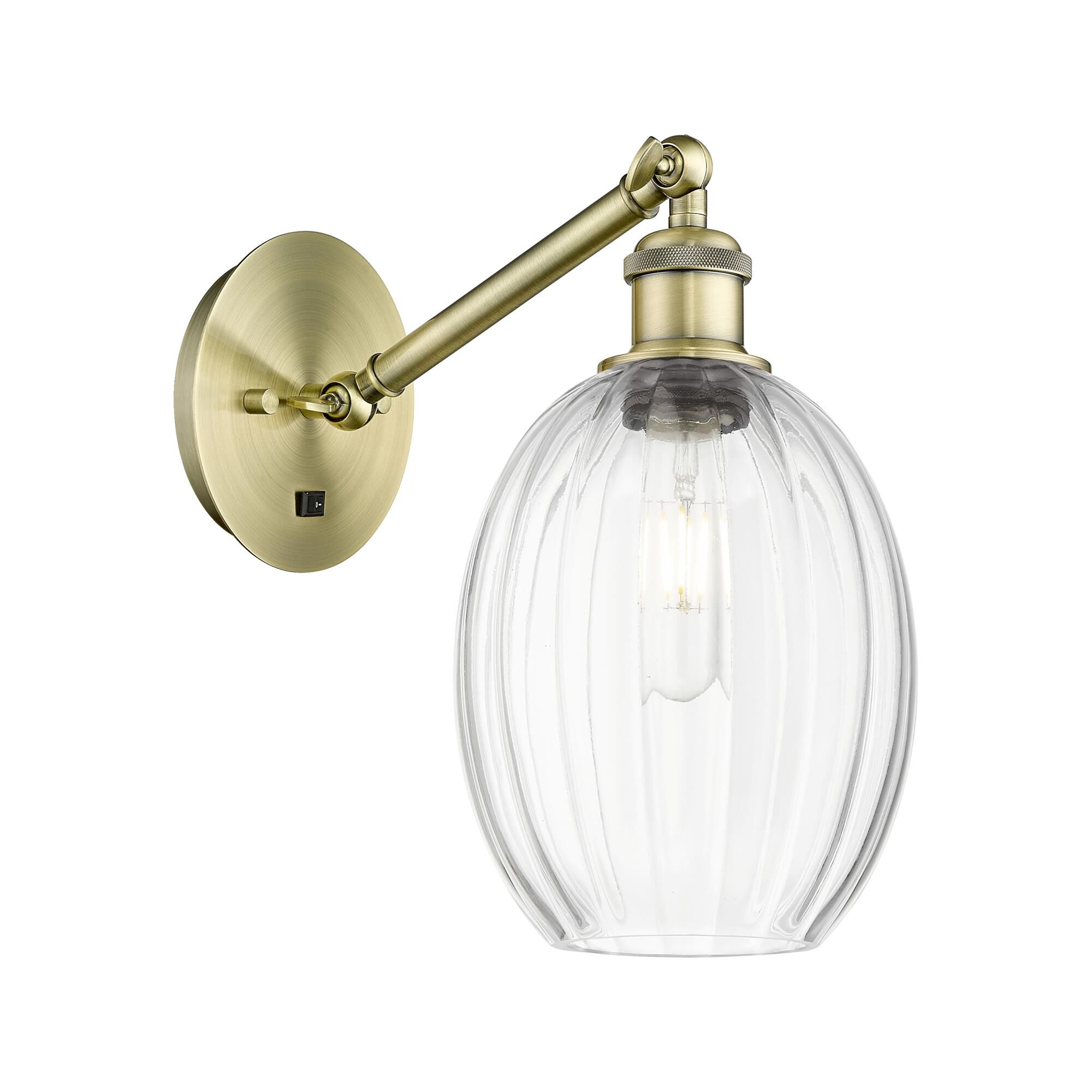 Shown in Antique Brass finish and Clear glass