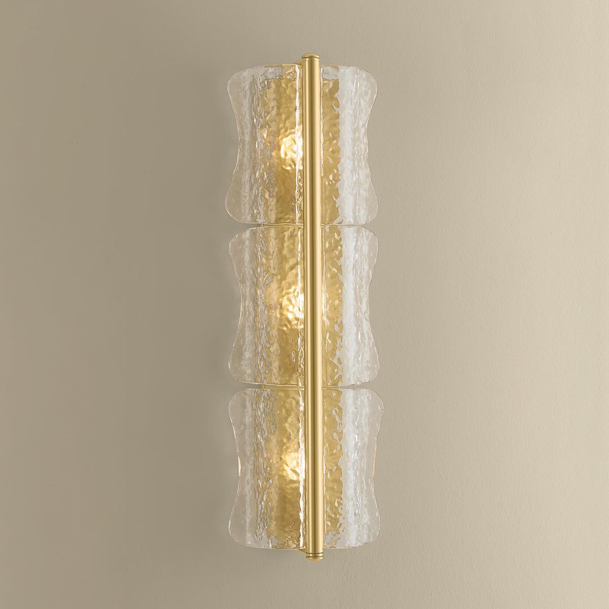 Shown in Aged Brass finish and Clear Optic glass