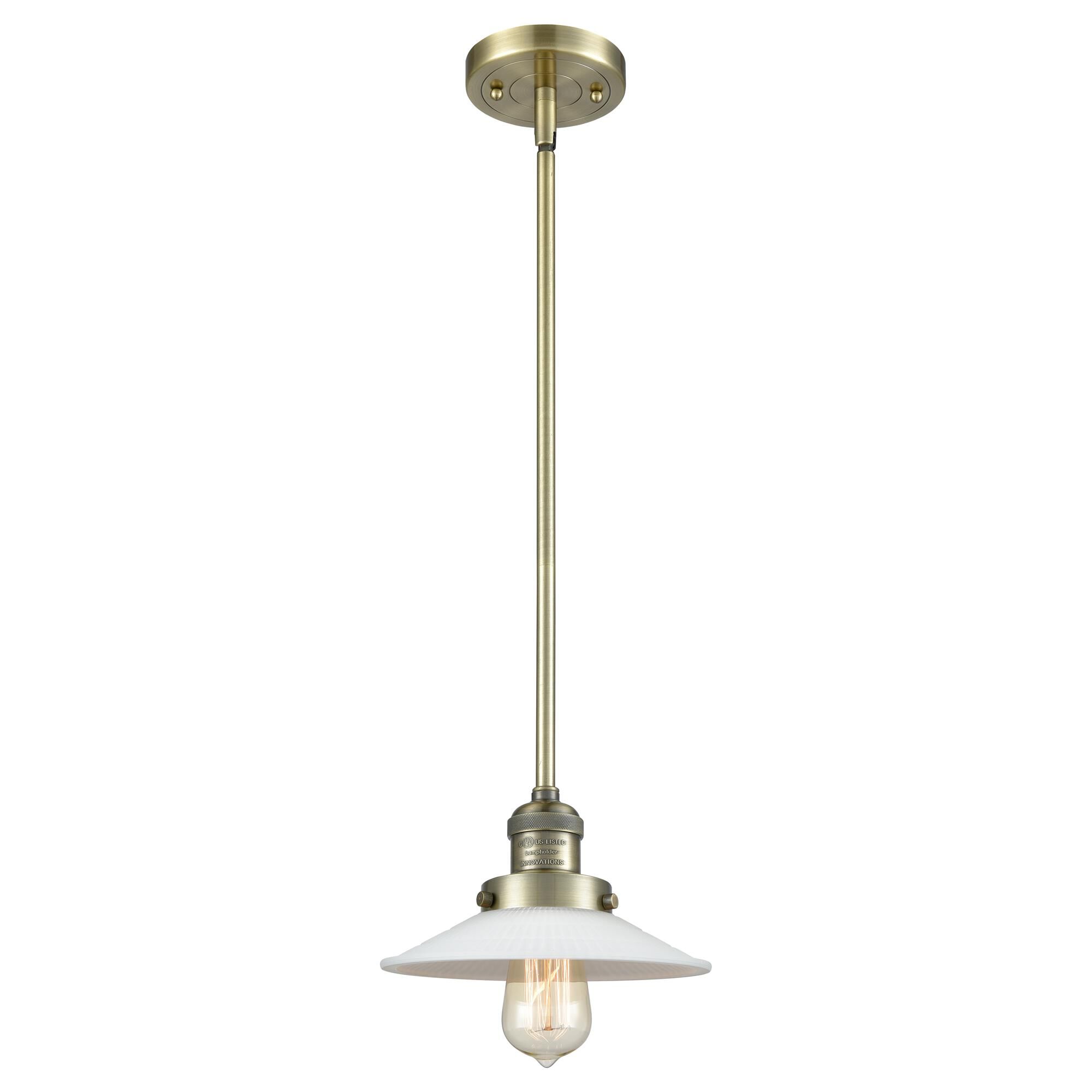 Shown in Antique Brass finish and Matte White Halophane - Cone glass