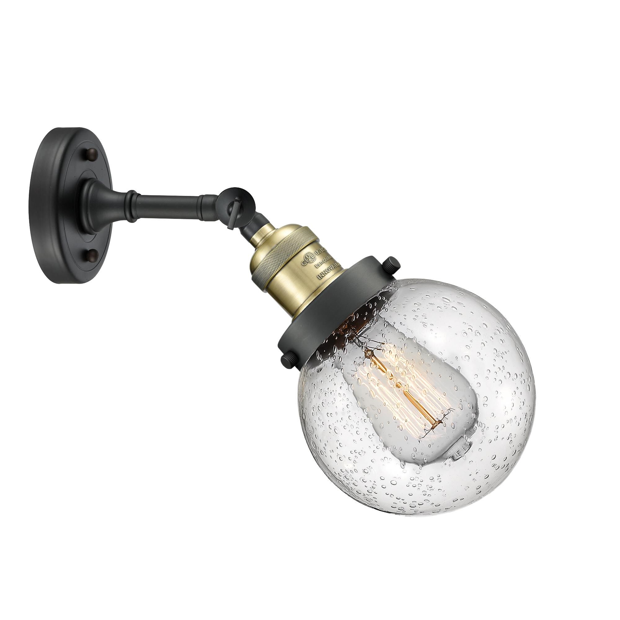 Shown in Black Antique Brass finish and Seedy glass and No Accent accent