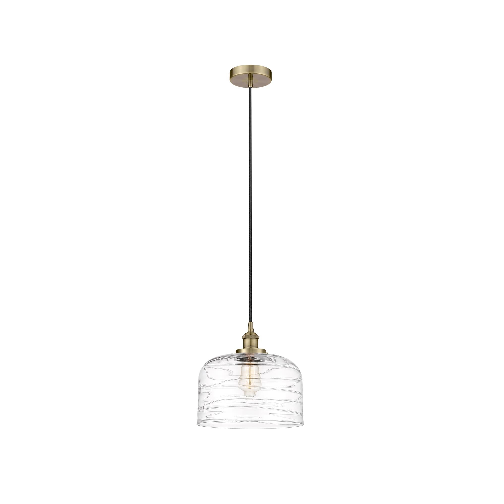 Shown in Antique Brass finish and Clear glass