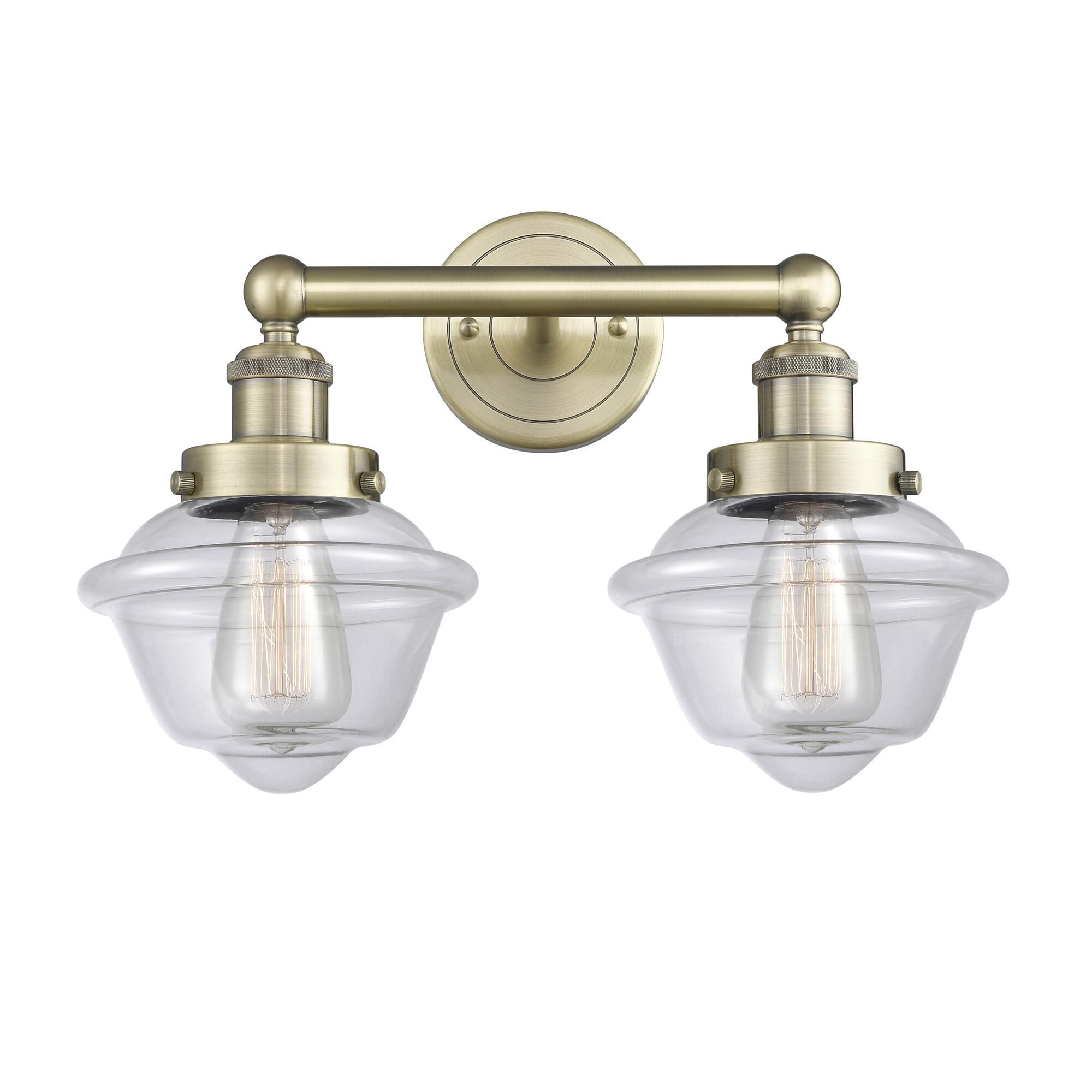 Shown in Antique Brass finish and Clear glass