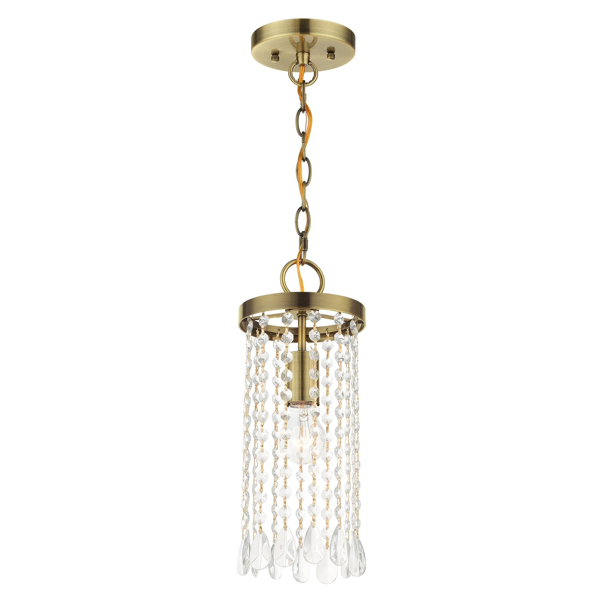 Shown in Antique Brass finish and Hand Assembled Crystal Shade glass