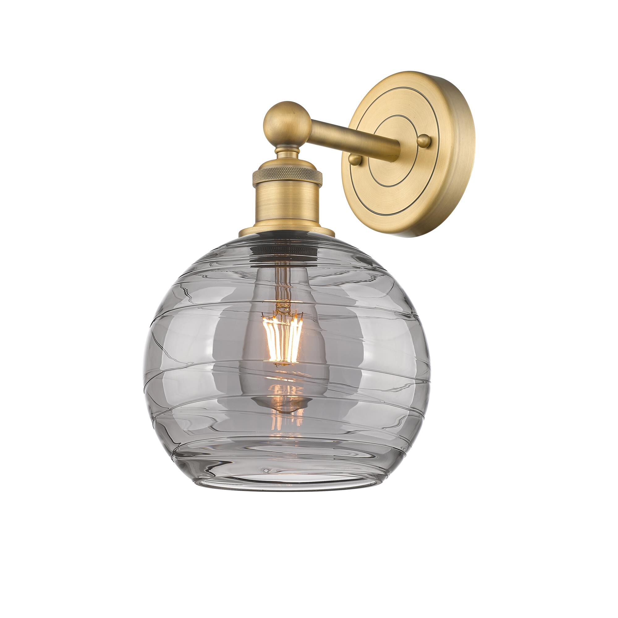 Shown in Brushed Brass finish and Light Smoke Deco Swirl glass