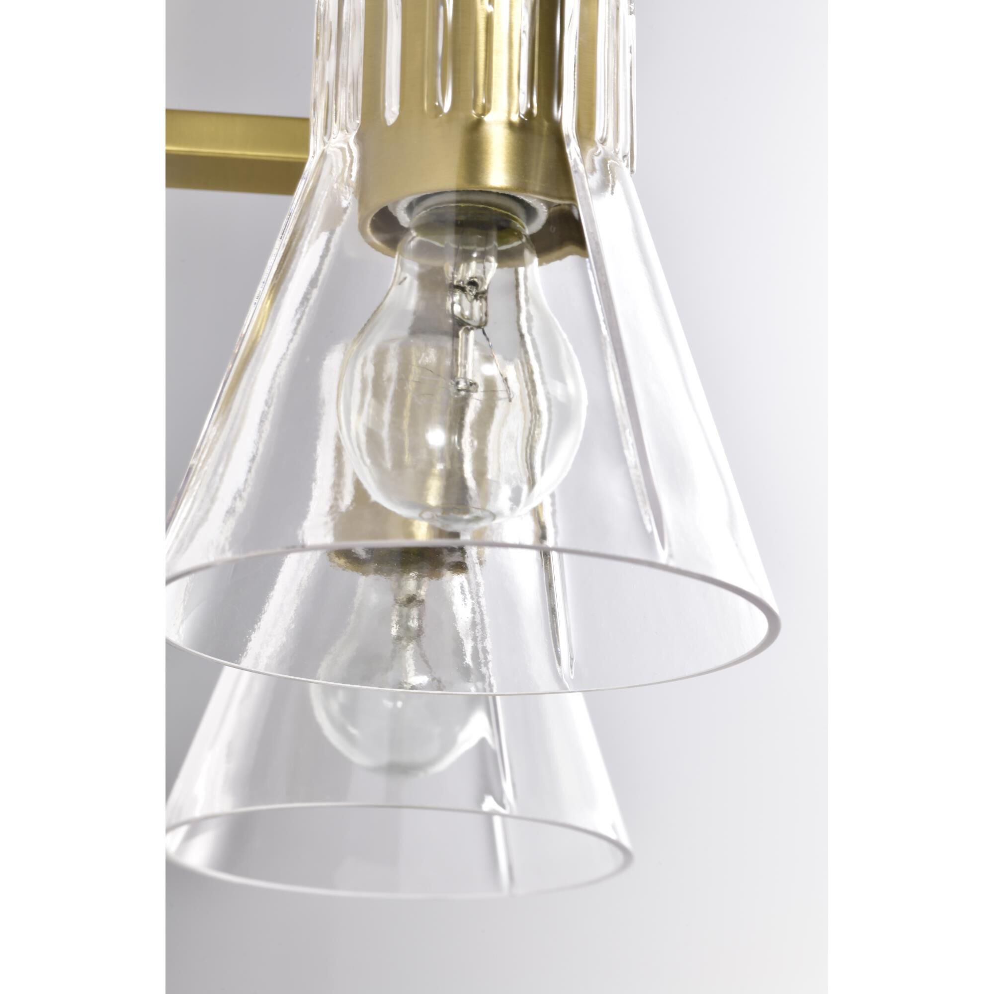 Shown in Vintage Brass finish and Clear glass