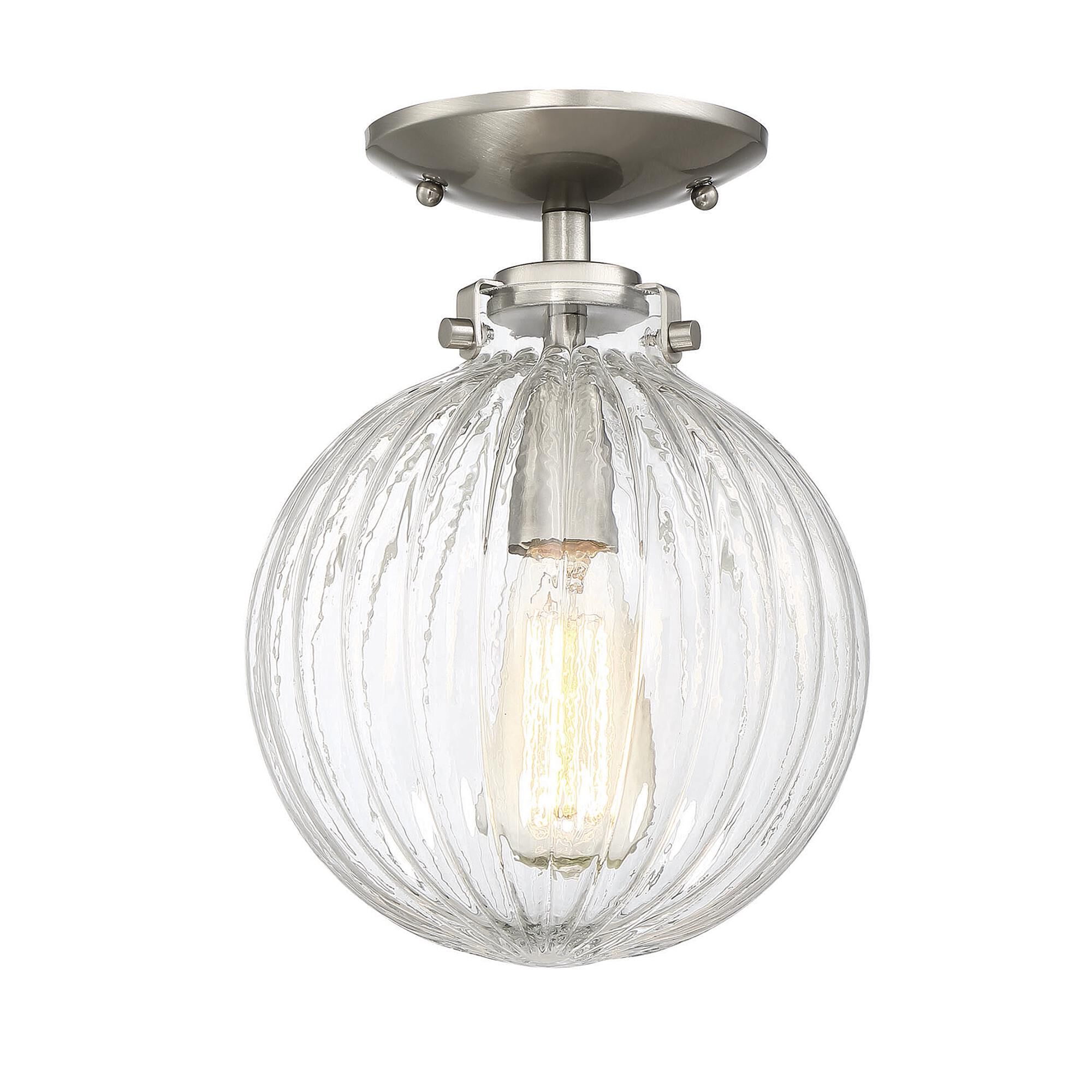 Shown in Brushed Nickel finish and Clear Ribbed glass