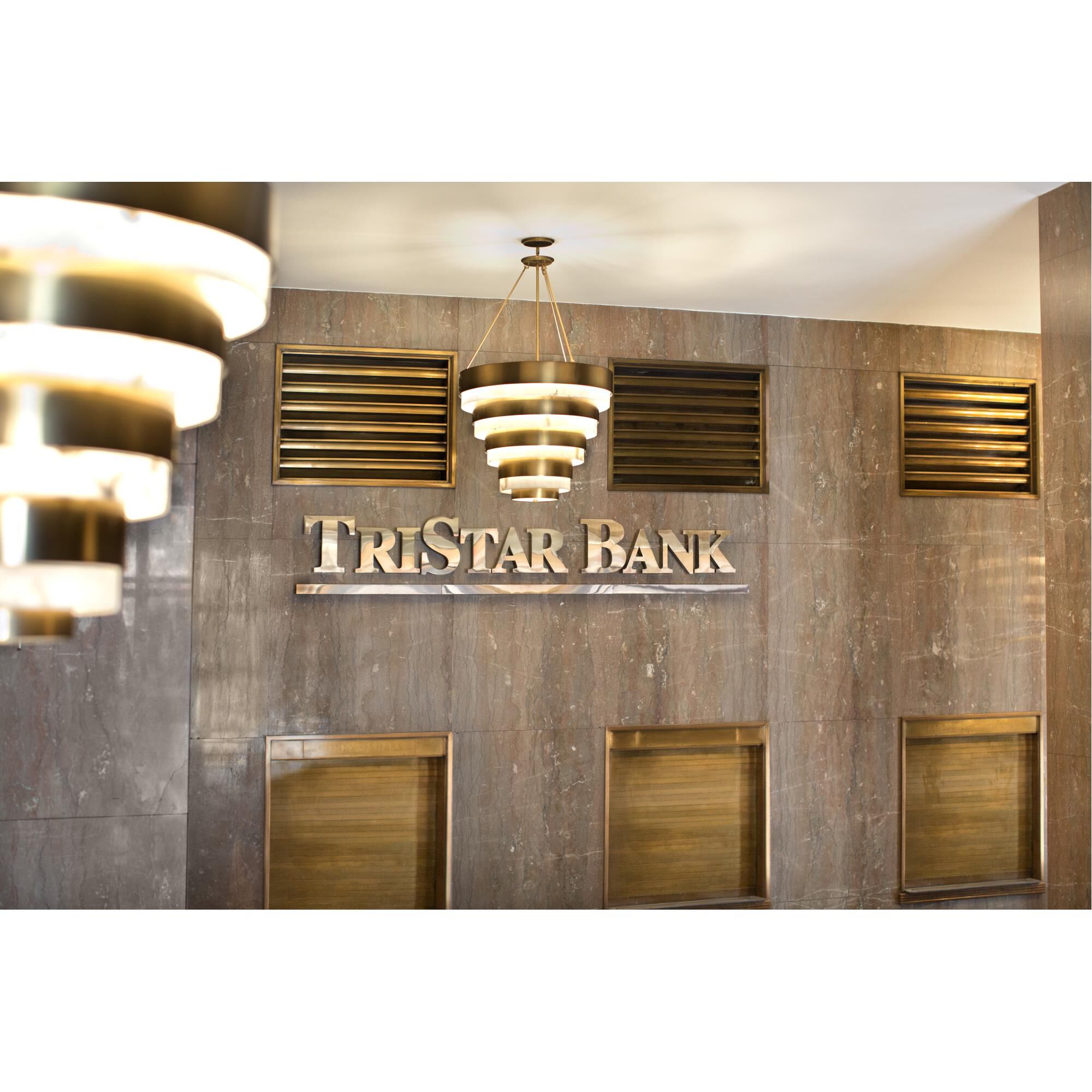 Shown in Heritage Brass finish and Faux Alabaster glass