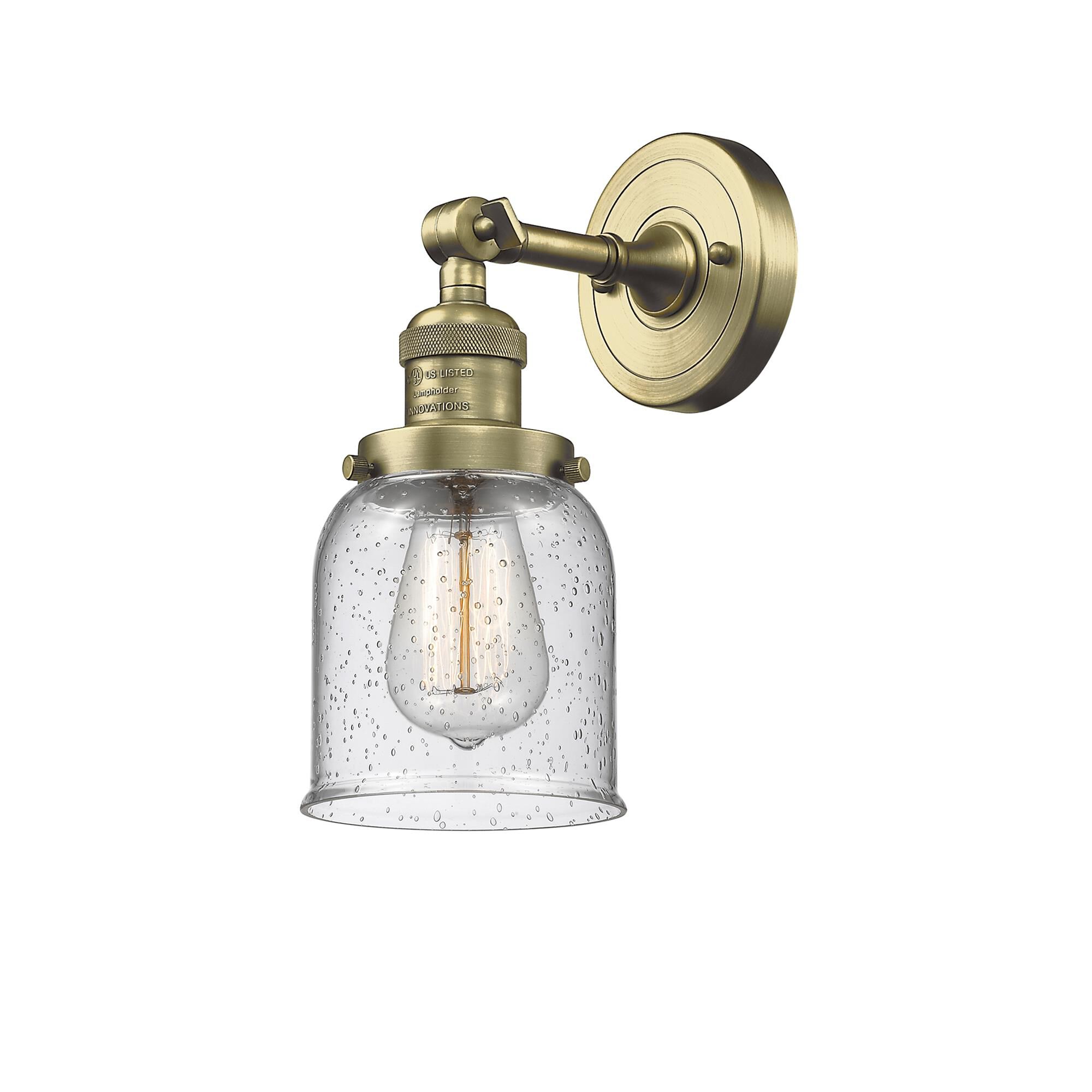 Shown in Antique Brass finish and Seedy glass