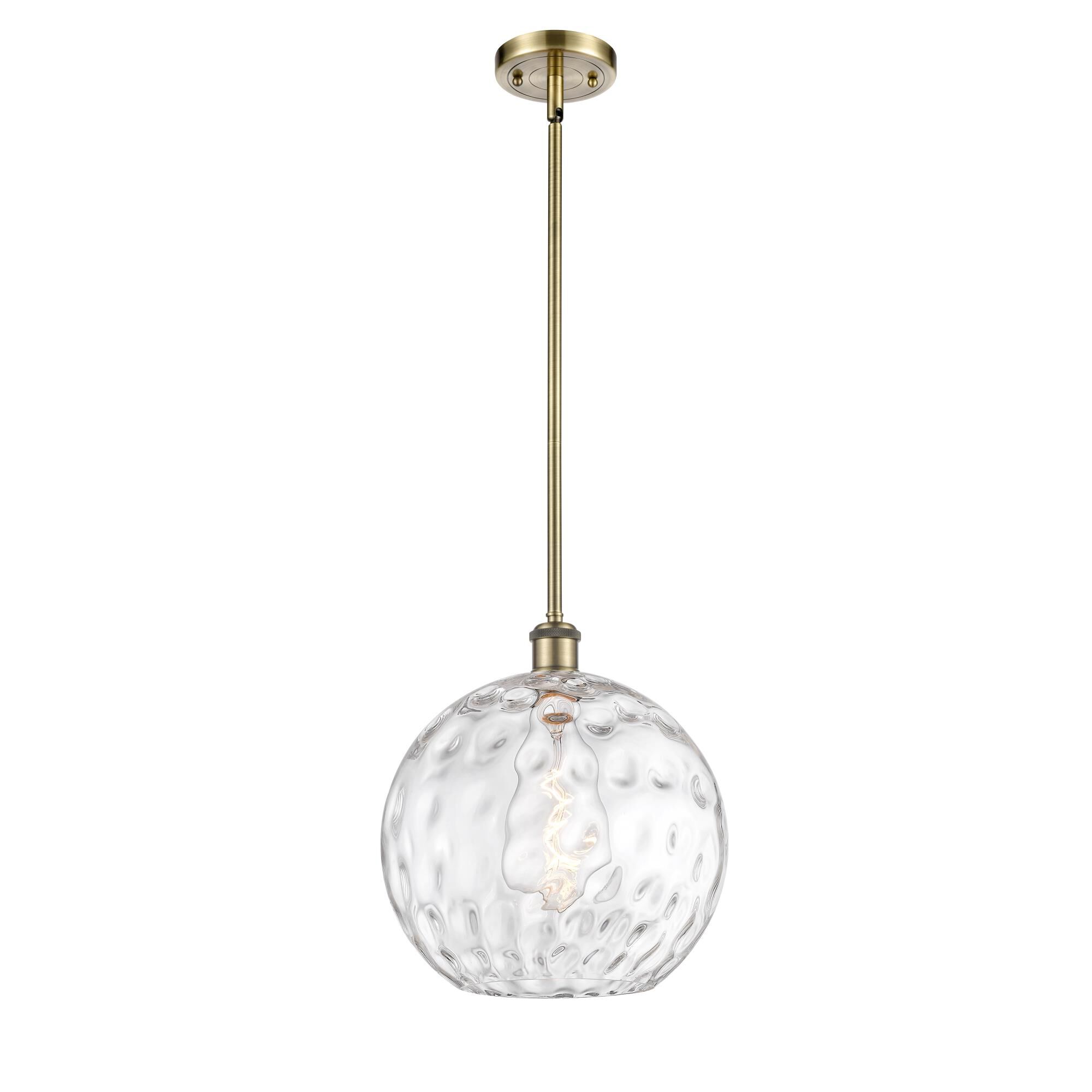 Shown in Antique Brass finish and Clear glass