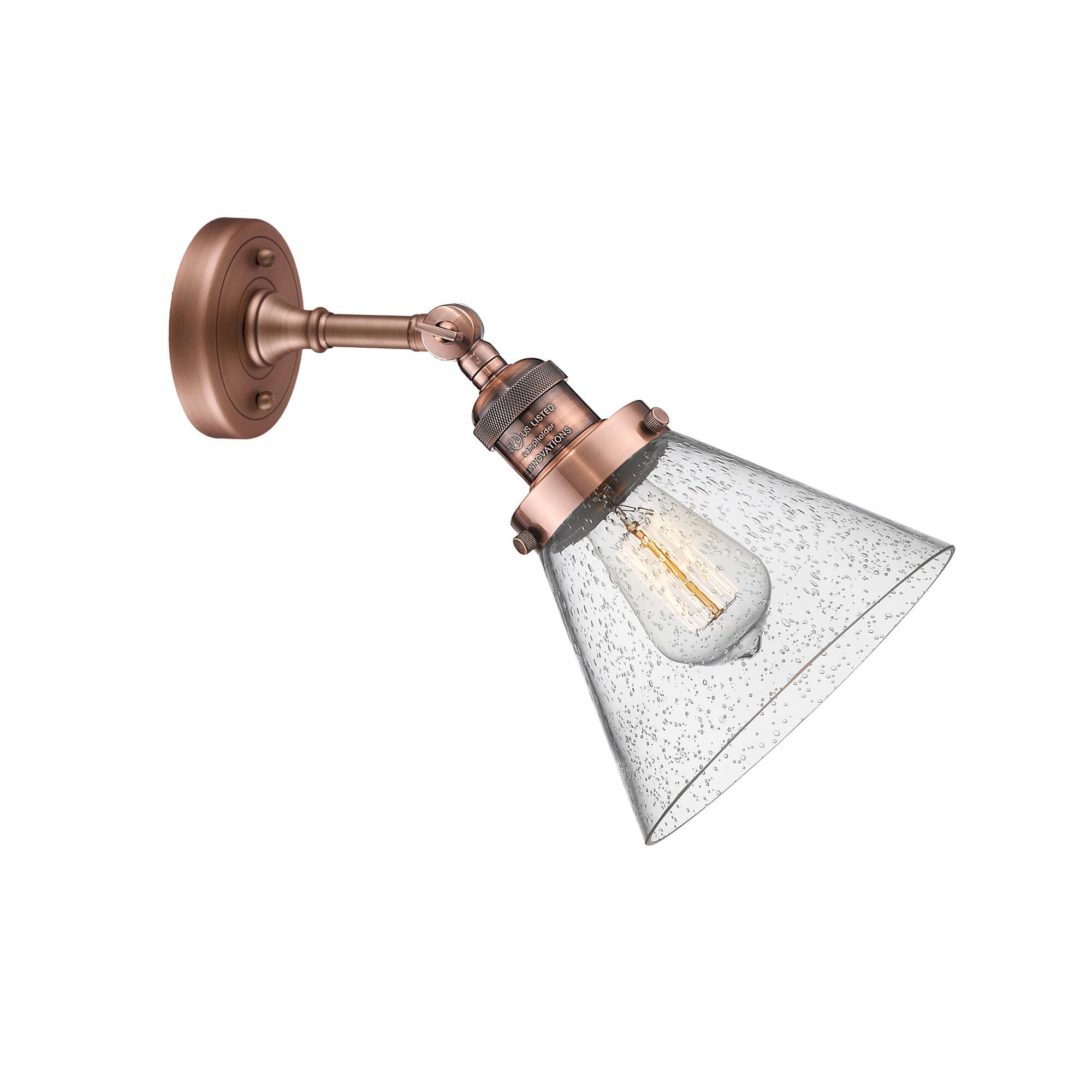 Shown in Antique Copper finish and Seedy glass and None accent