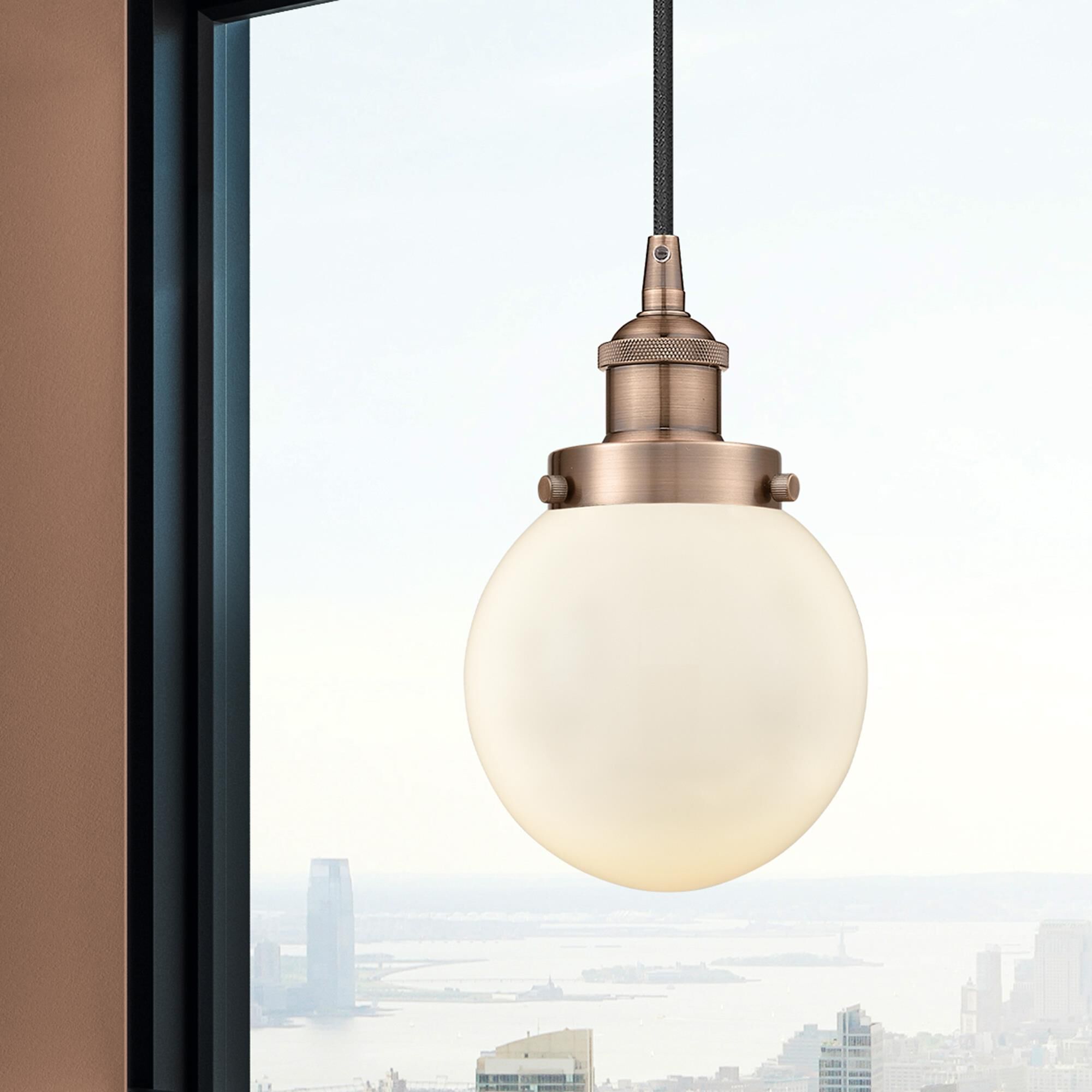 Shown in Antique Copper finish and Matte White glass