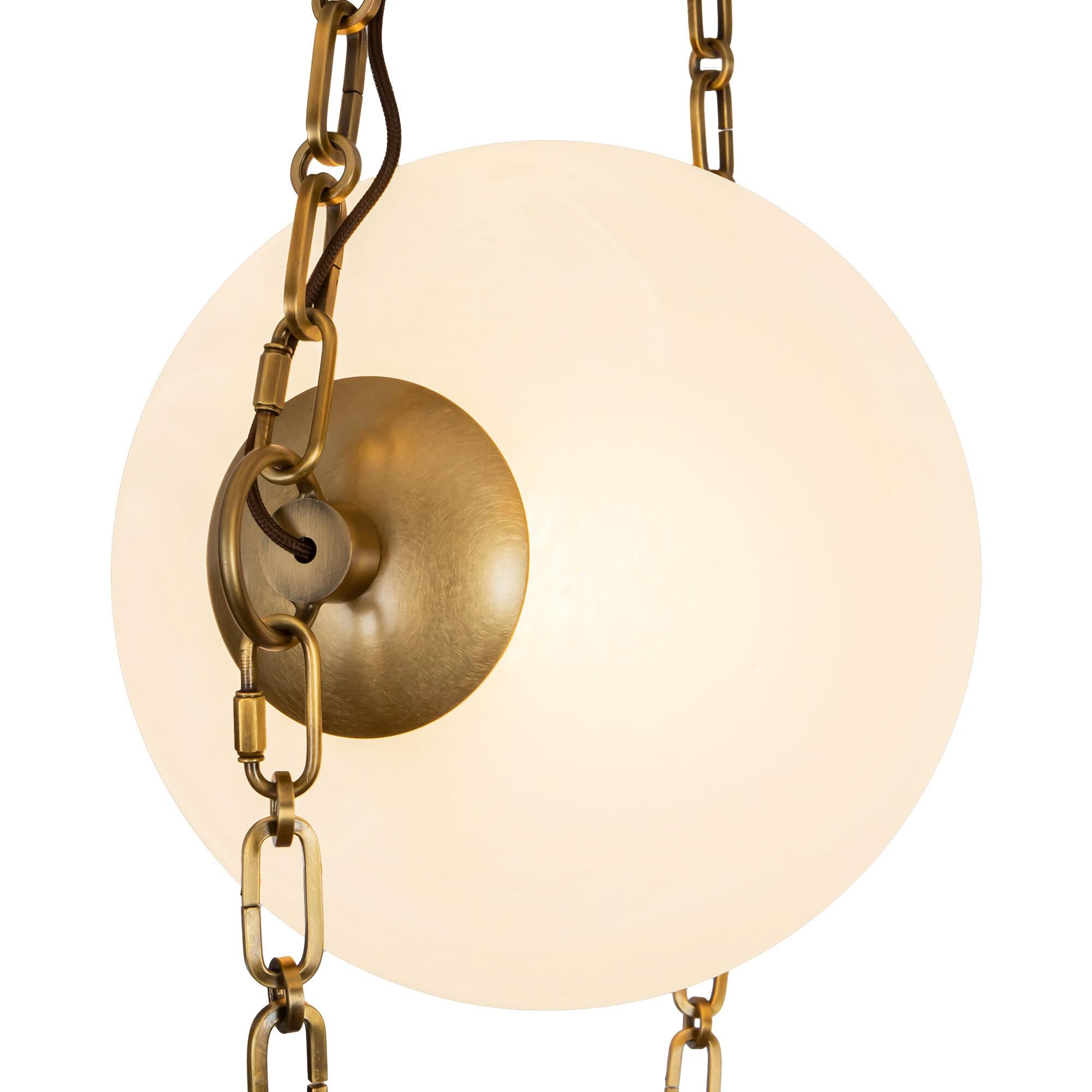 Shown in Vintage Brass finish and Cloud glass