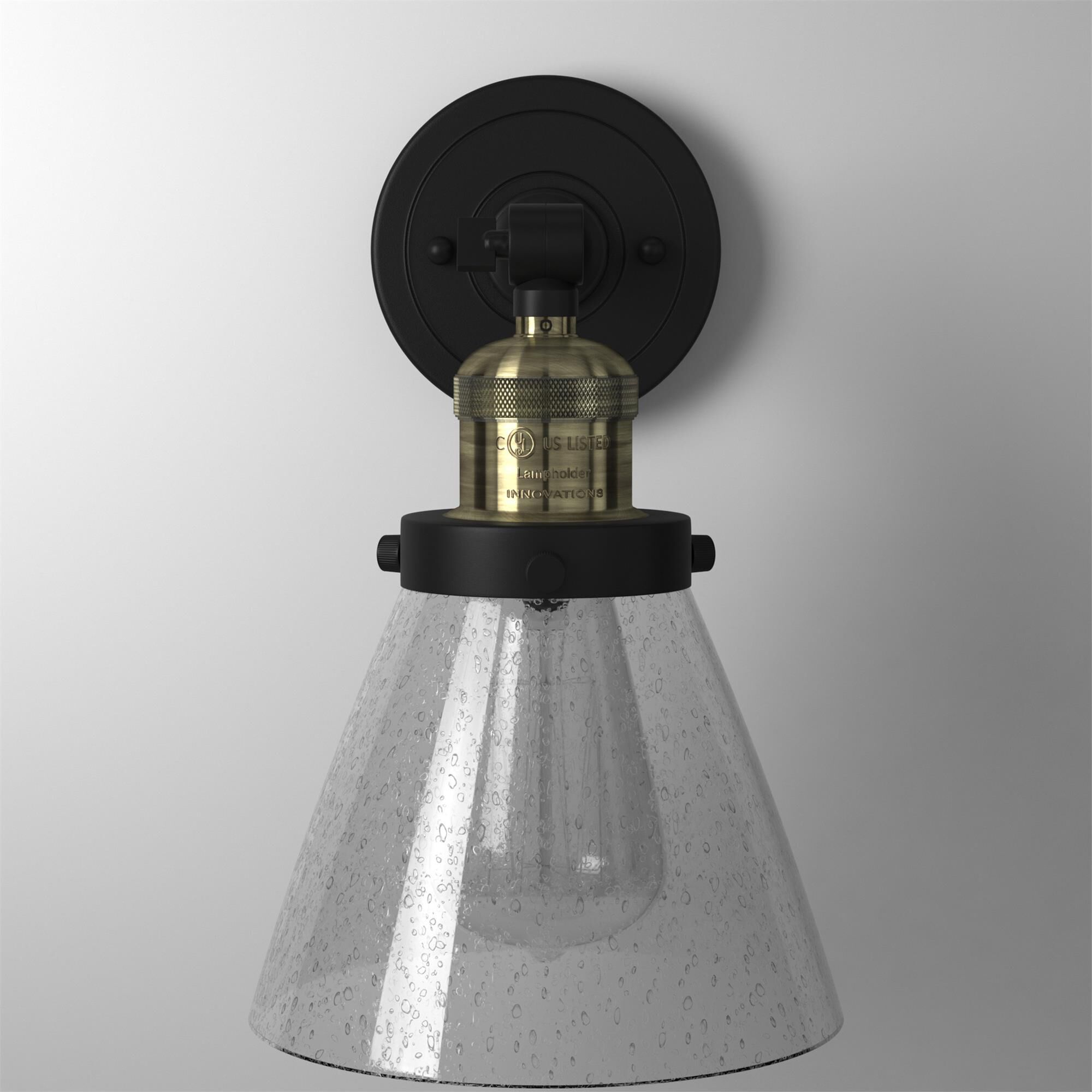 Shown in Black Antique Brass finish and Seedy glass