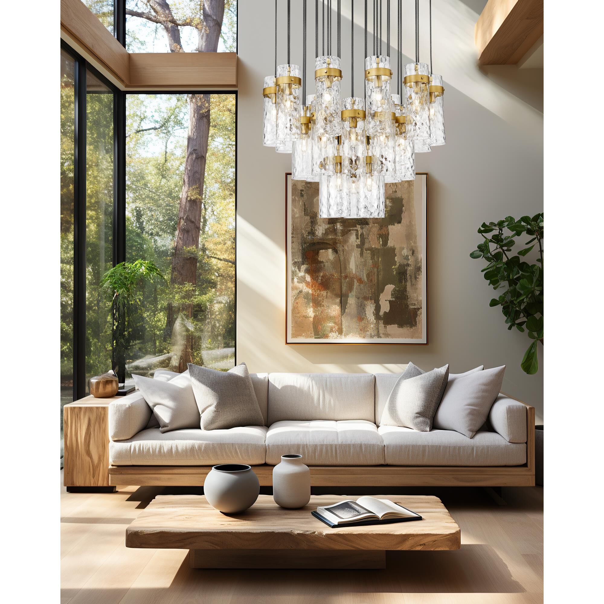 Shown in Rubbed Brass finish and Clear Water glass and Clear Water shade