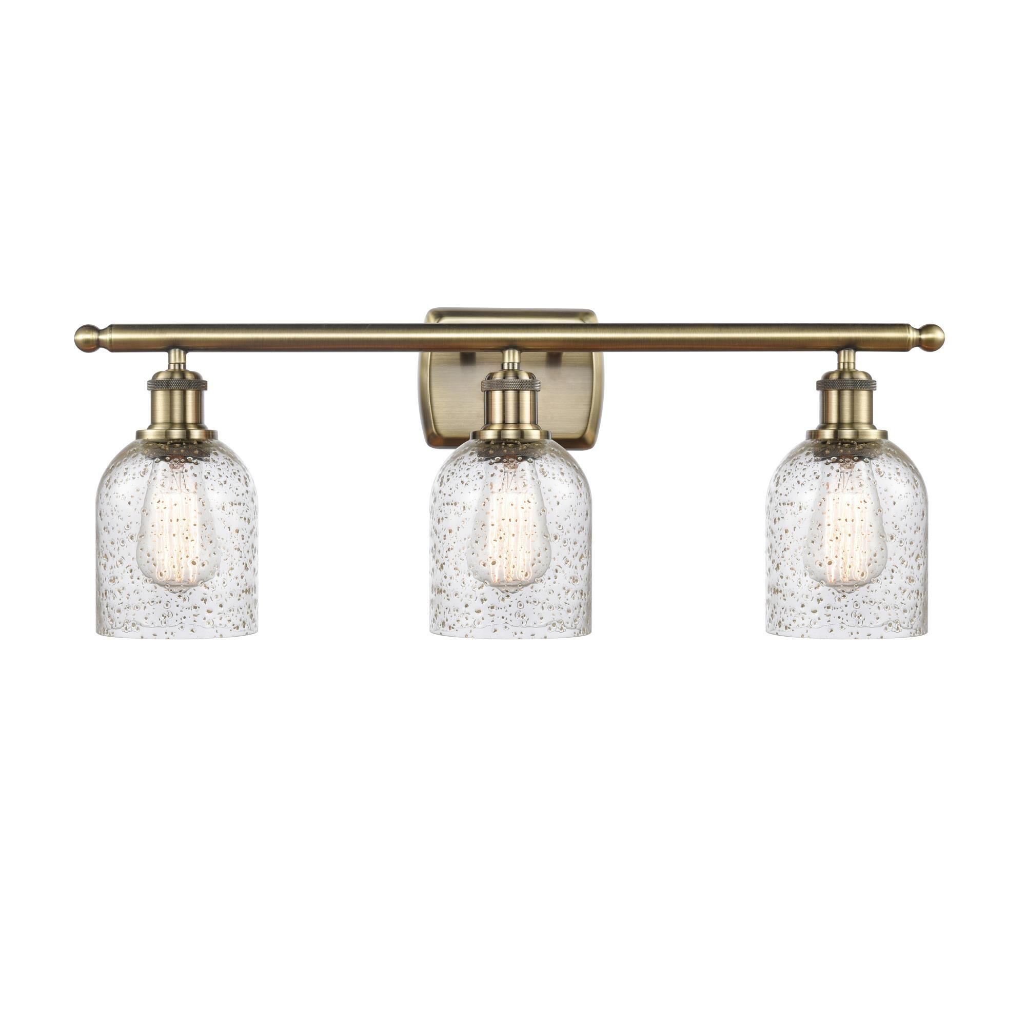Shown in Antique Brass finish and Bell glass and Glass shade and Polished Chrome accent
